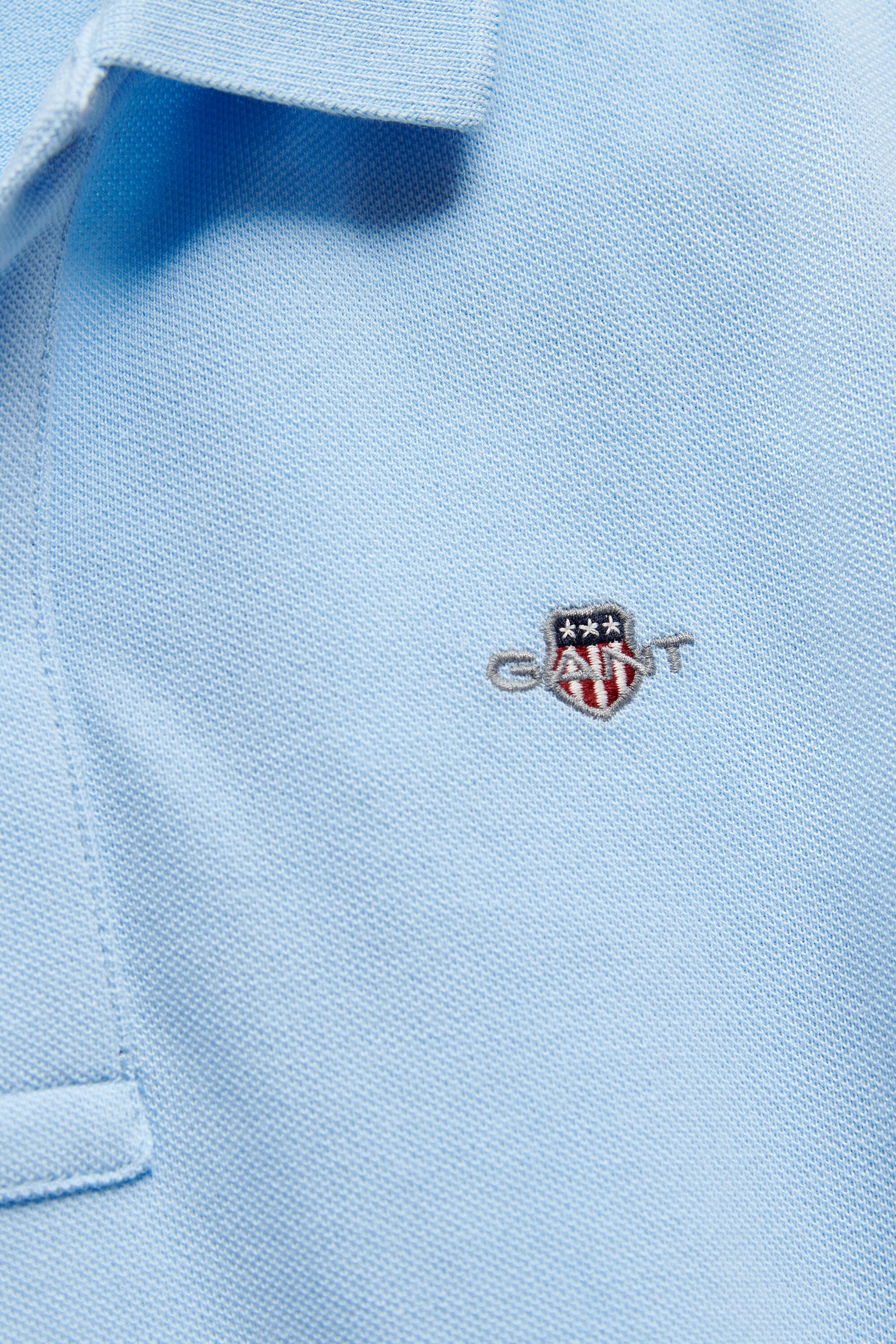 Polo en coton piqué Shield Ado