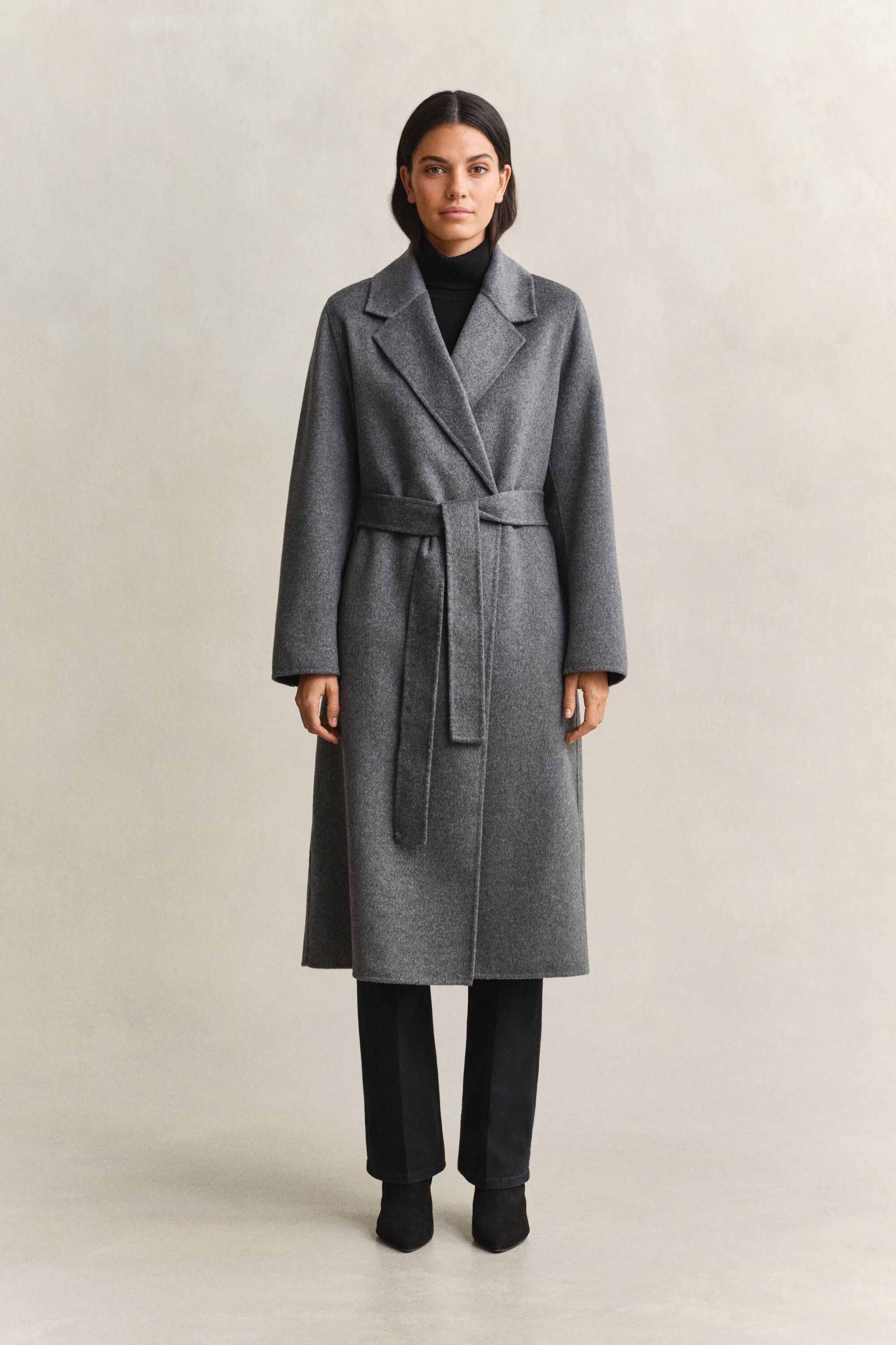 Manteau cousu main avec ceinture