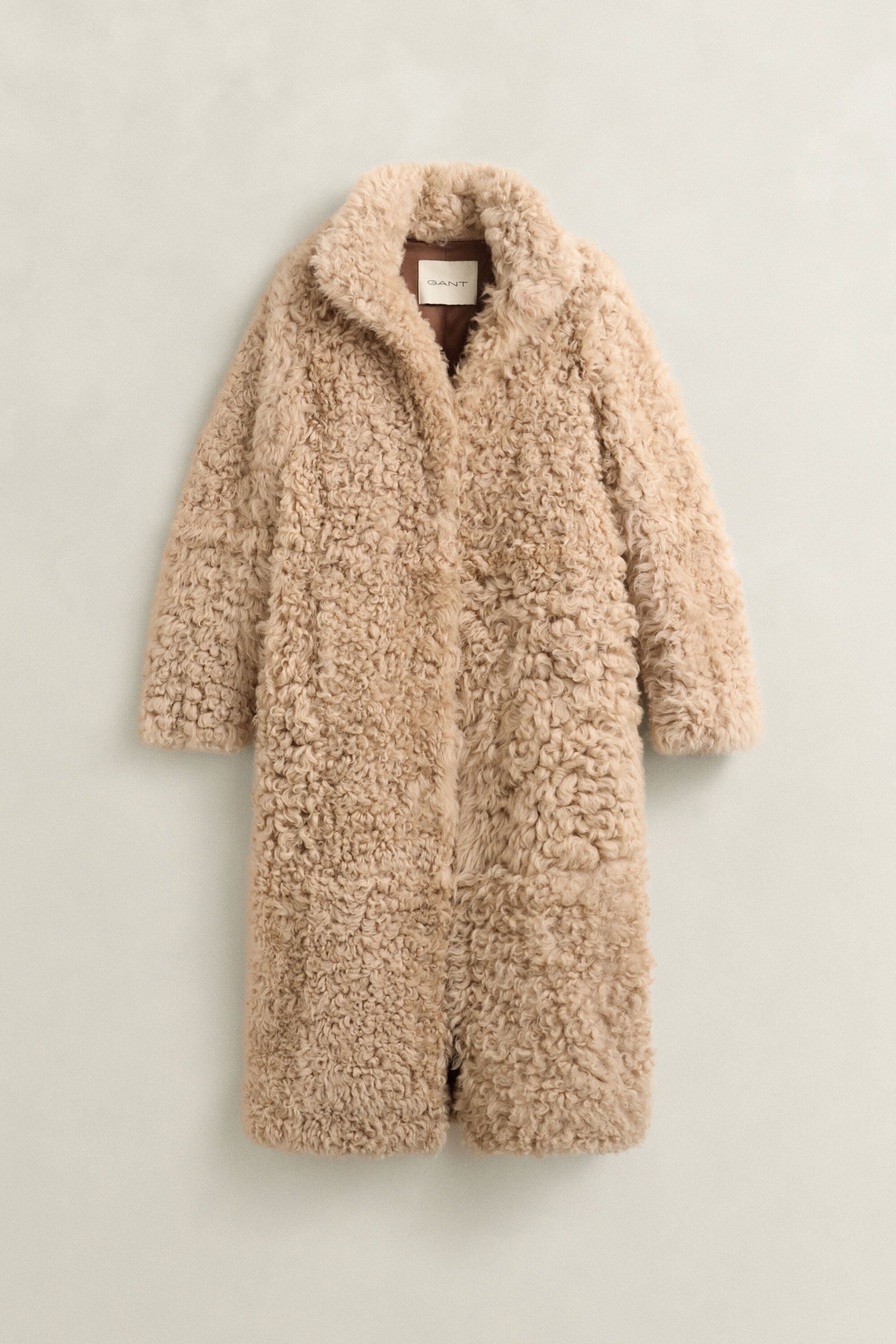 Manteau en peau lainée