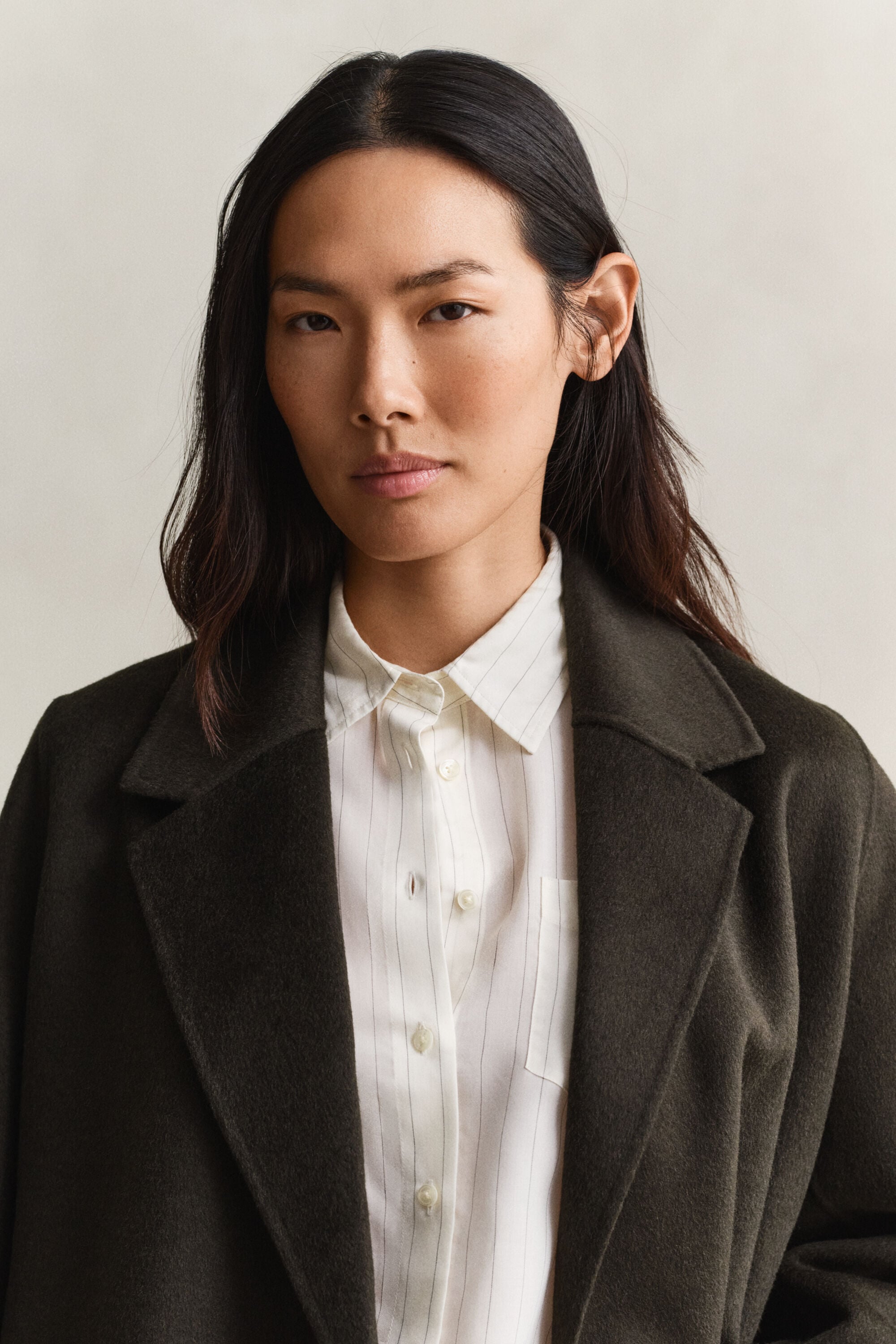 Manteau cousu main avec ceinture