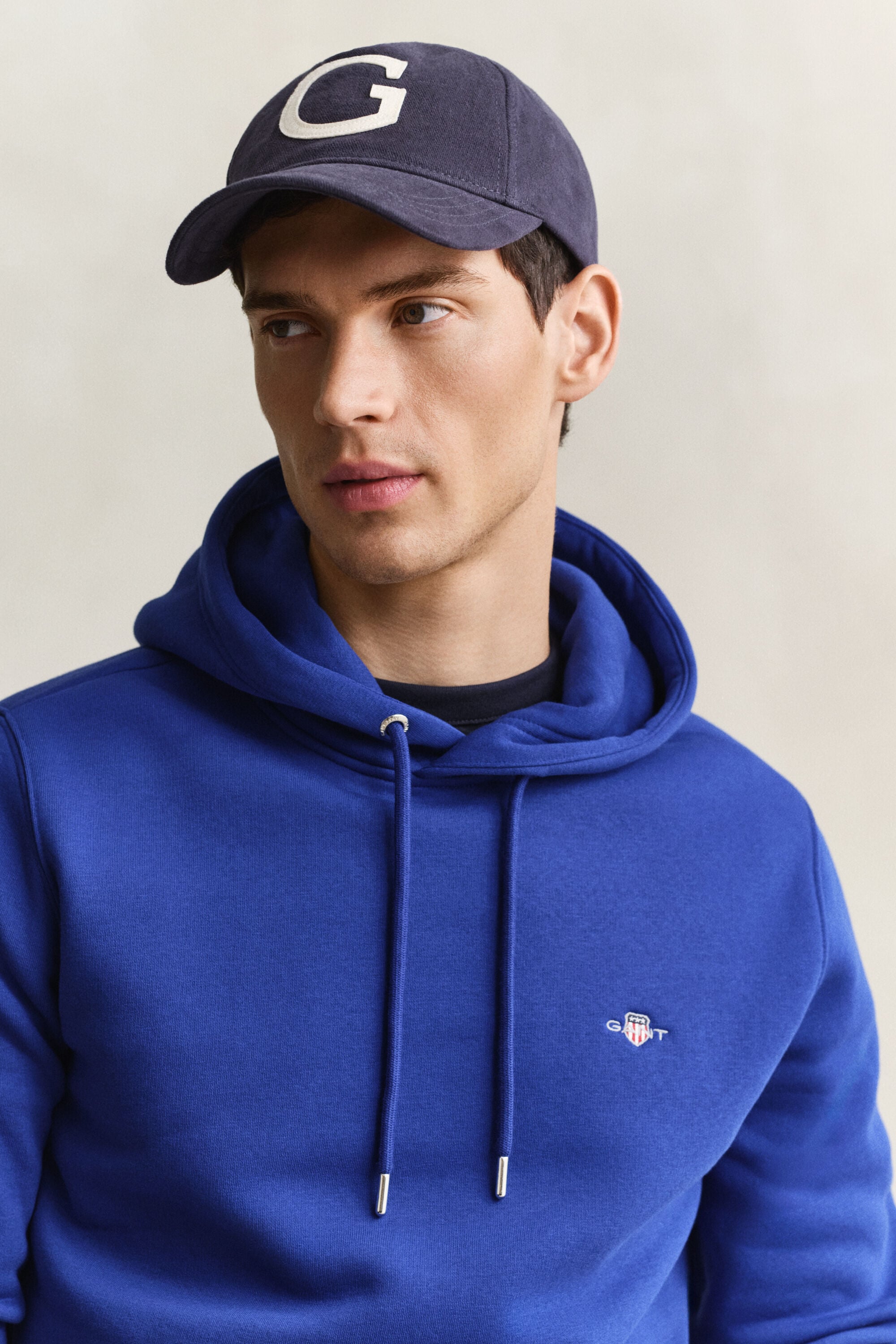 Sweat à capuche avec écusson