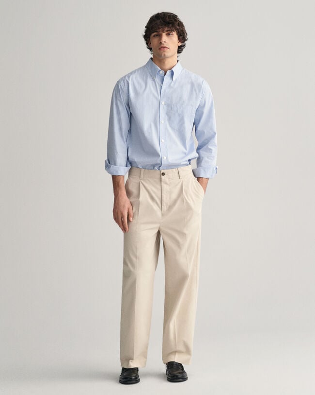 Pantalon chino relaxed fit en coton bross&eacute;