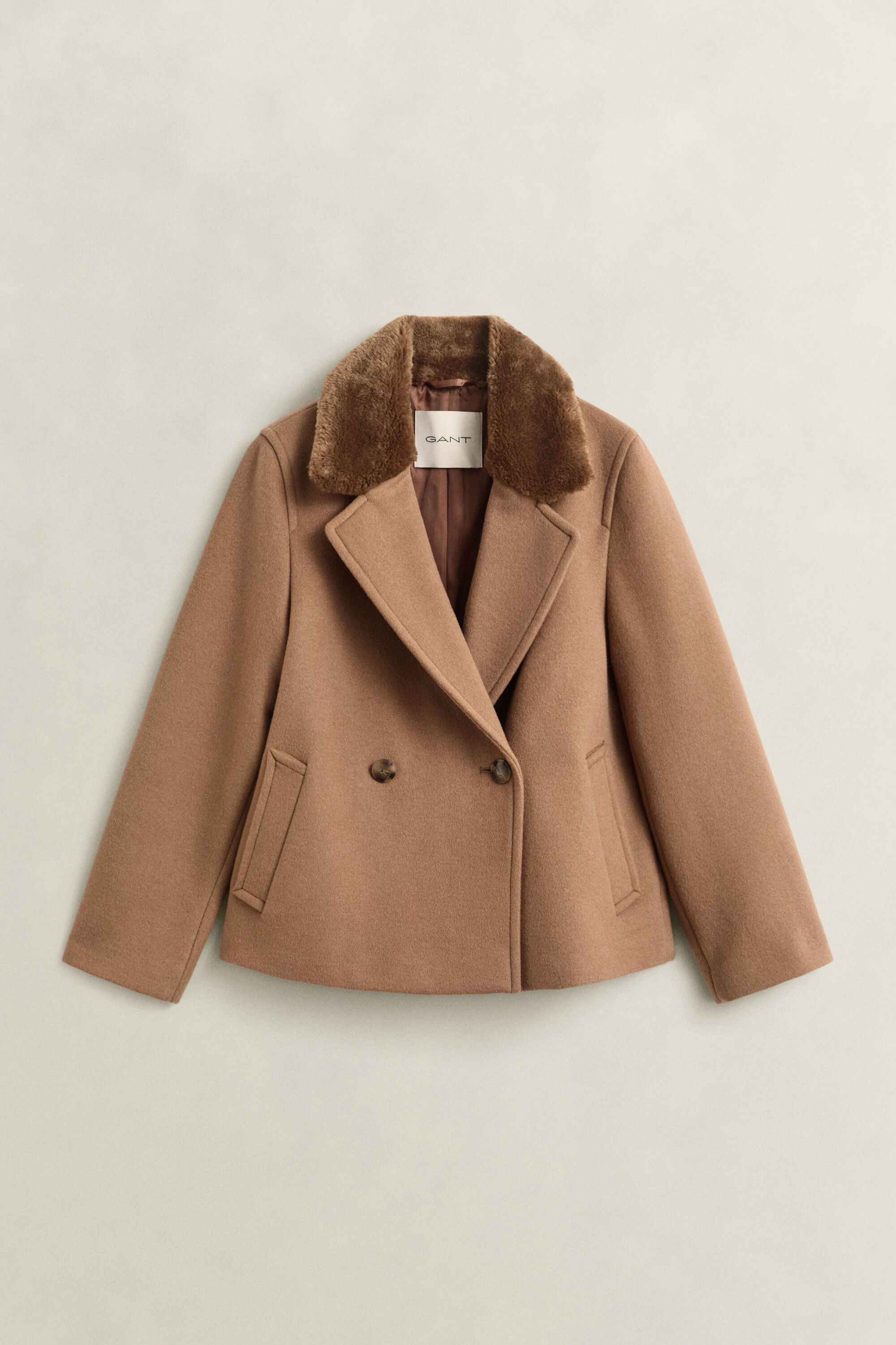Veste avec col en fourrure synthétique