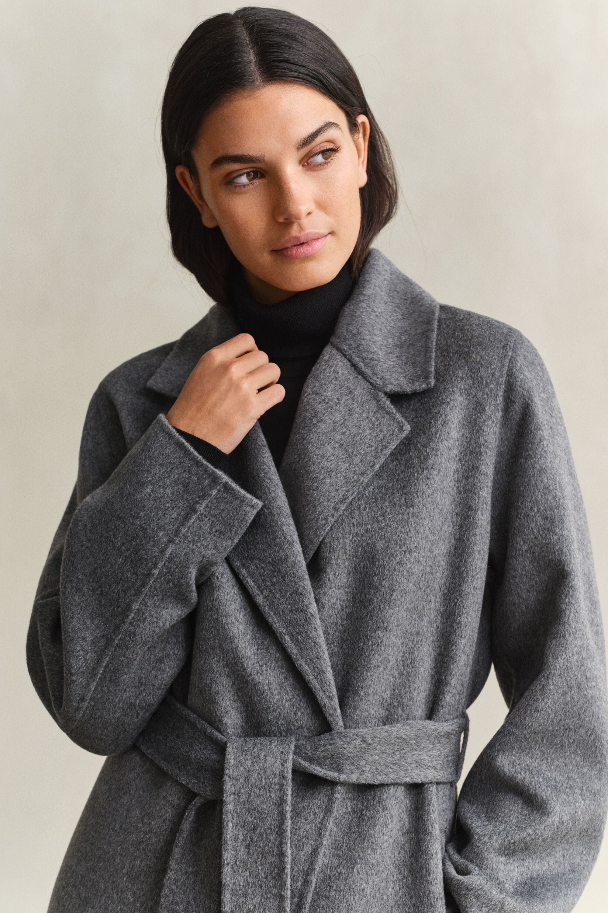 Manteau cousu main avec ceinture