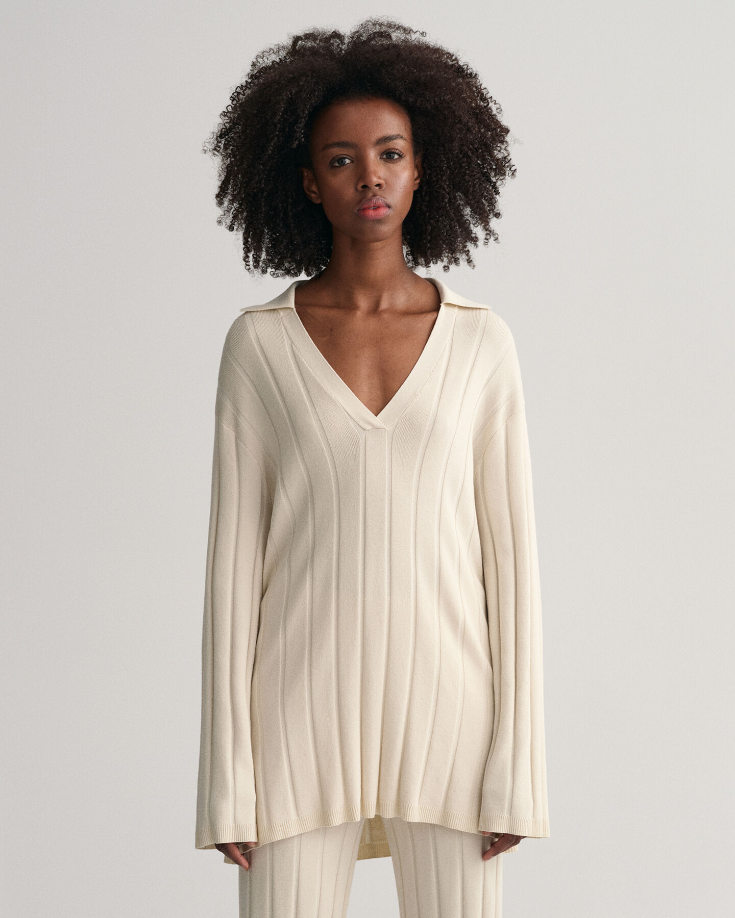 Pull en maille côtelée à col ouvert