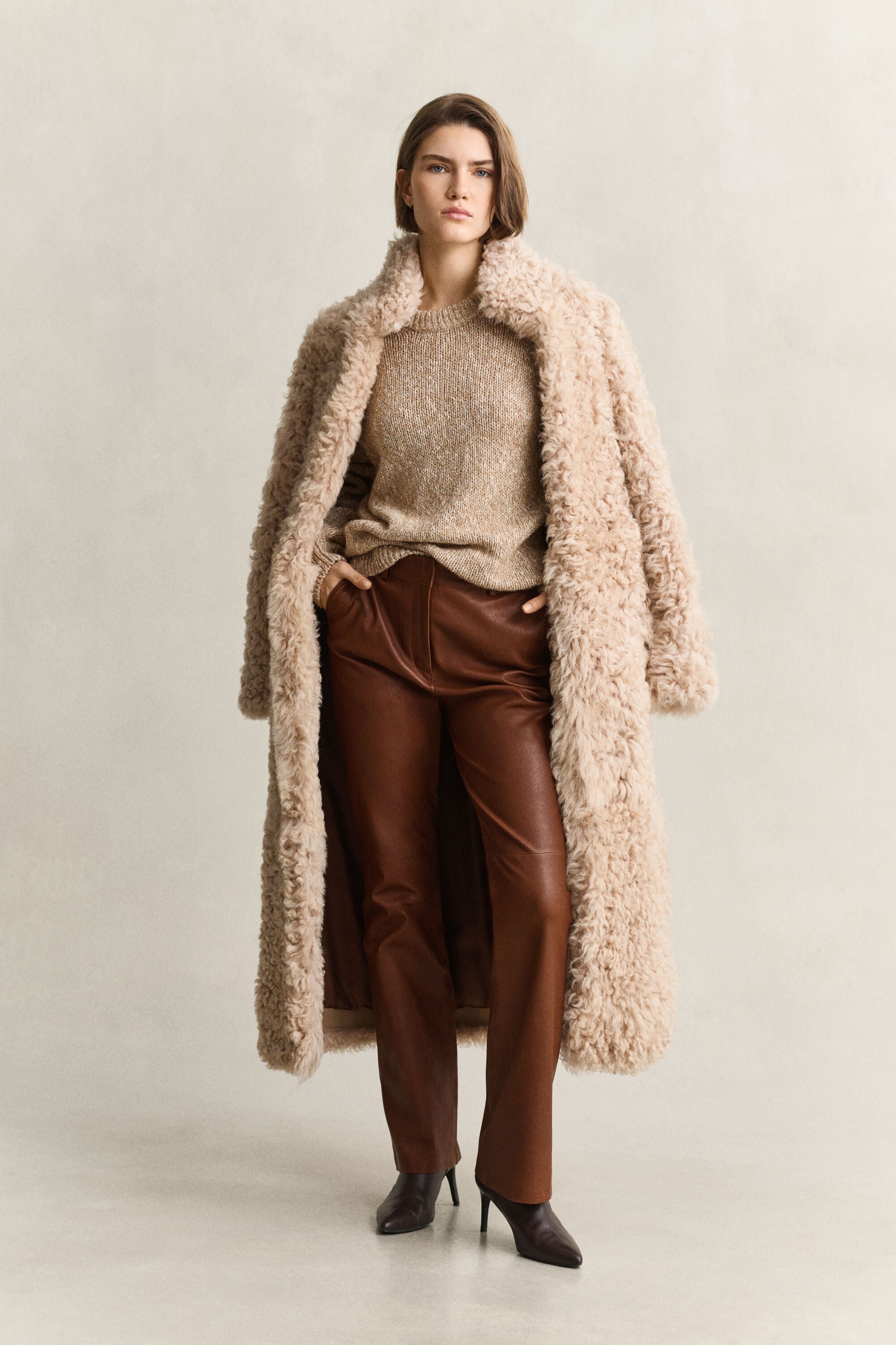 Manteau en peau lainée