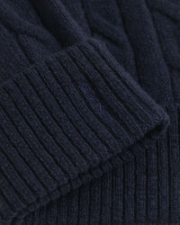 Bonnet en maille de laine à torsades