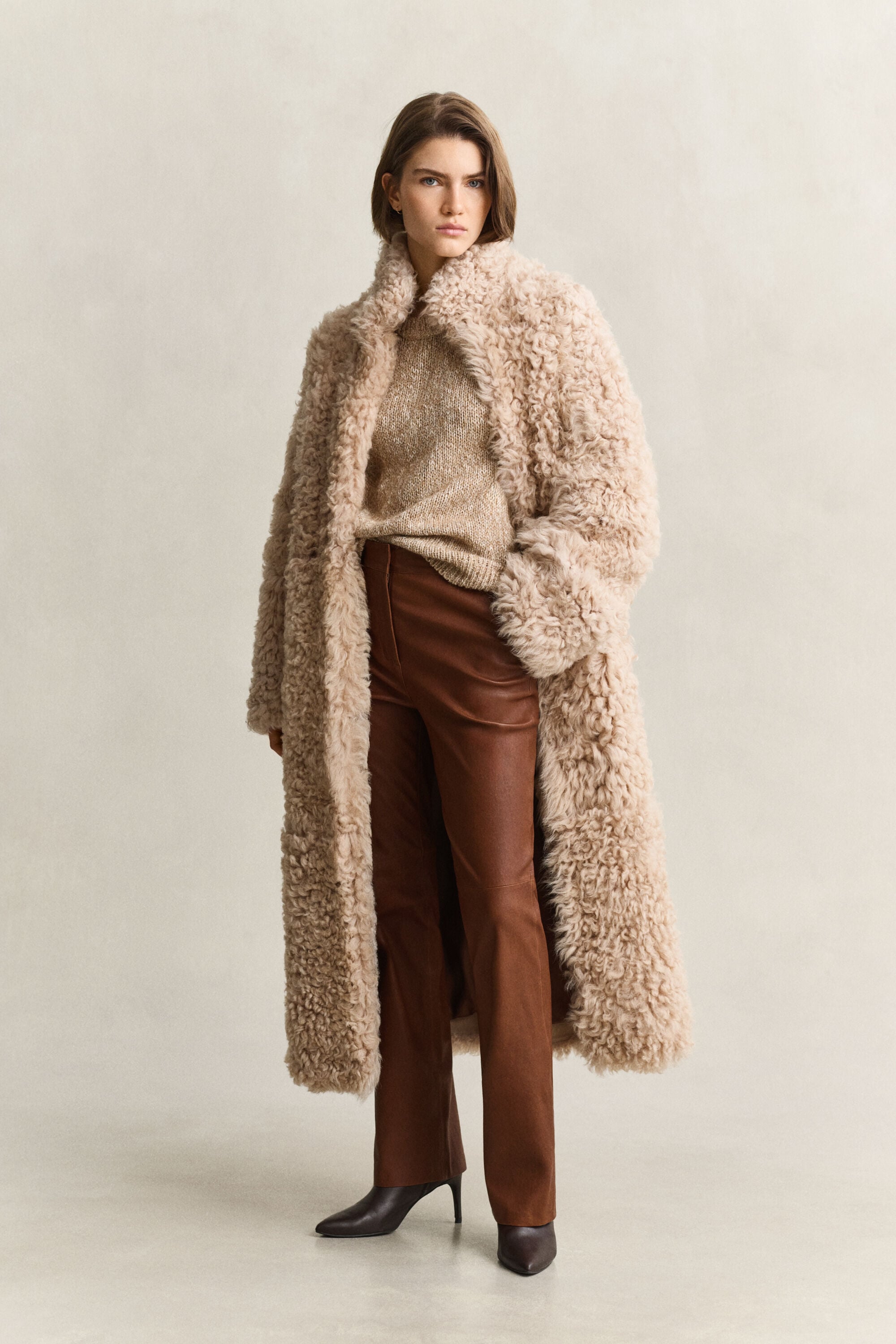 Manteau en peau lainée