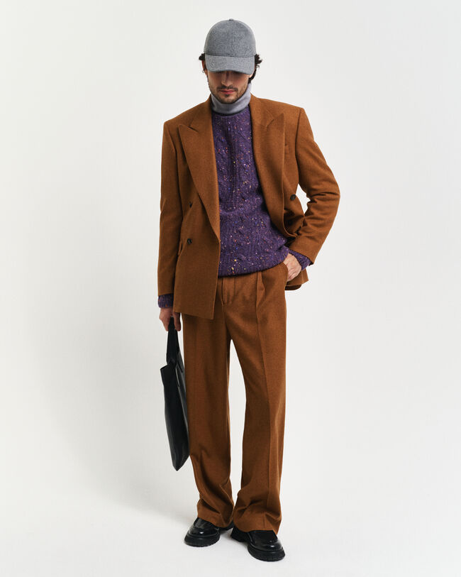 Pull en maille torsadée bouclée