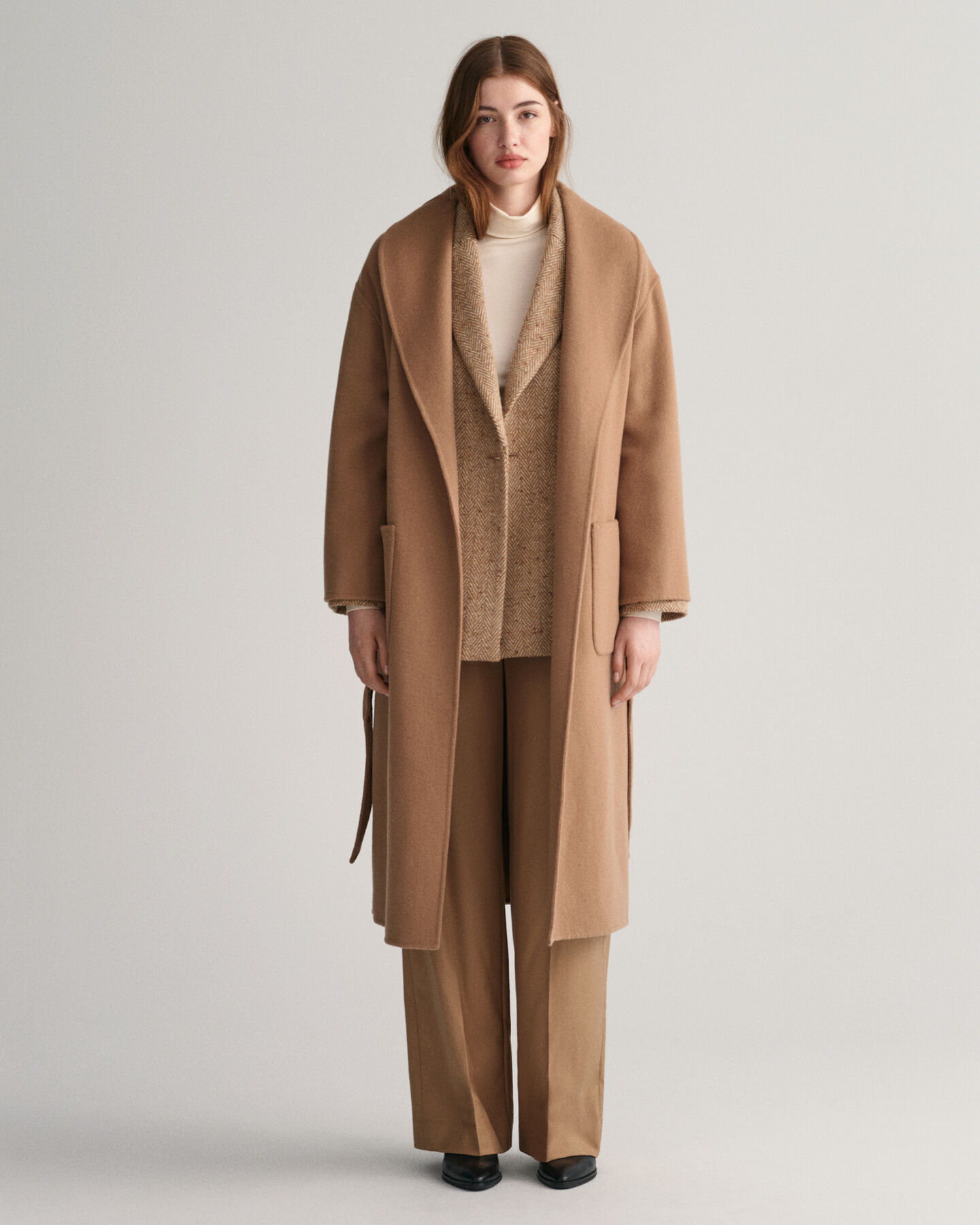 Manteau cousu main avec ceinture