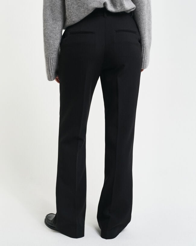 Pantalon habillé coupe slim évasé