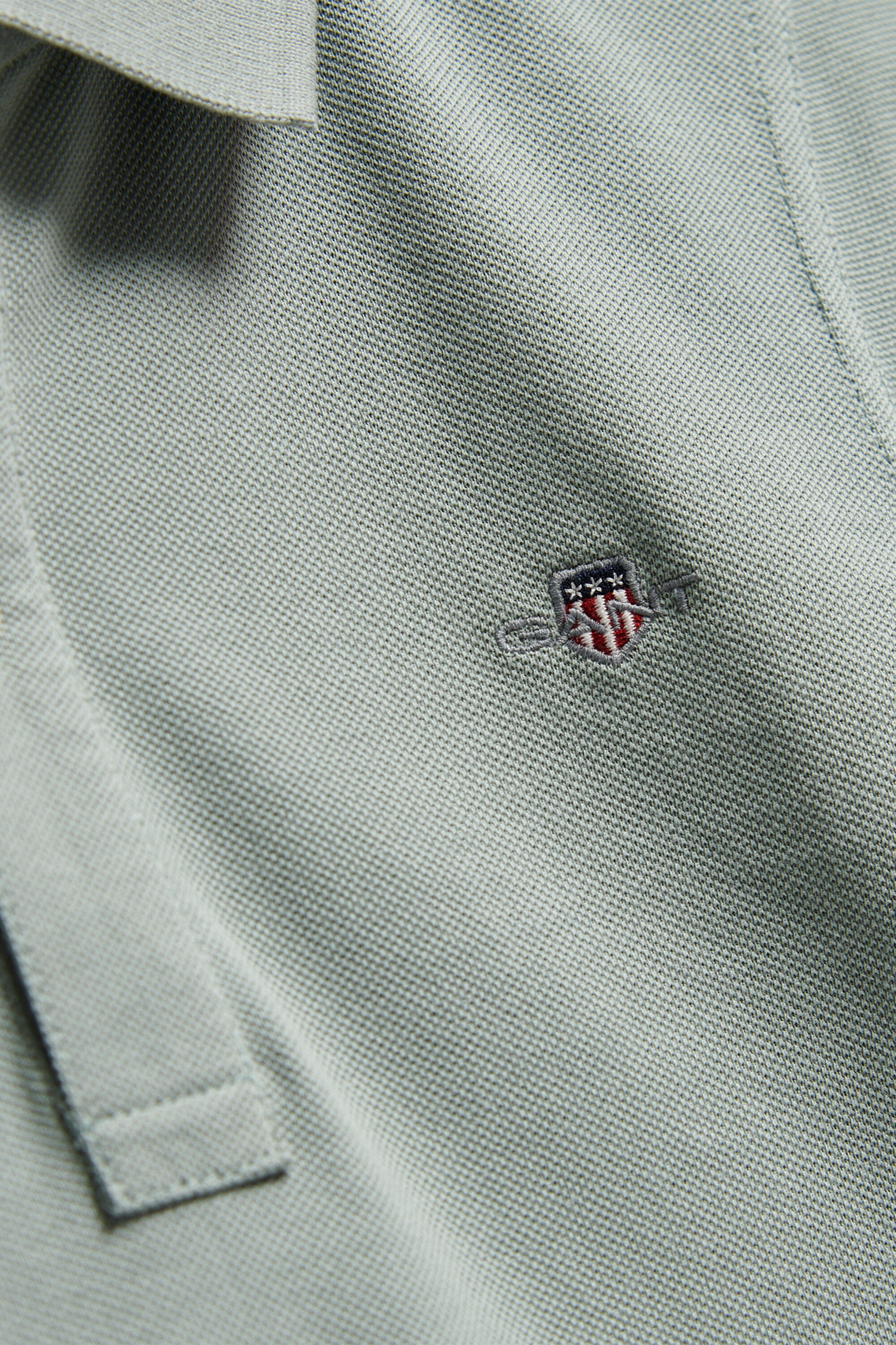 Polo en coton piqué Shield Ado