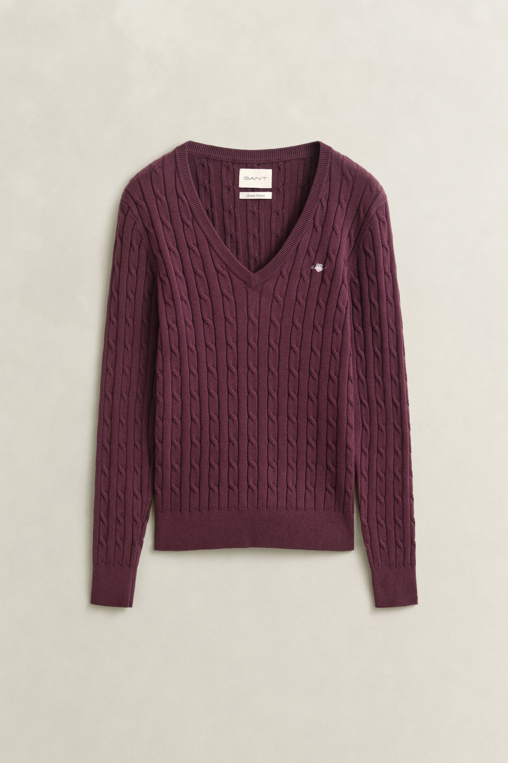Pull col V en maille de coton stretch à torsades