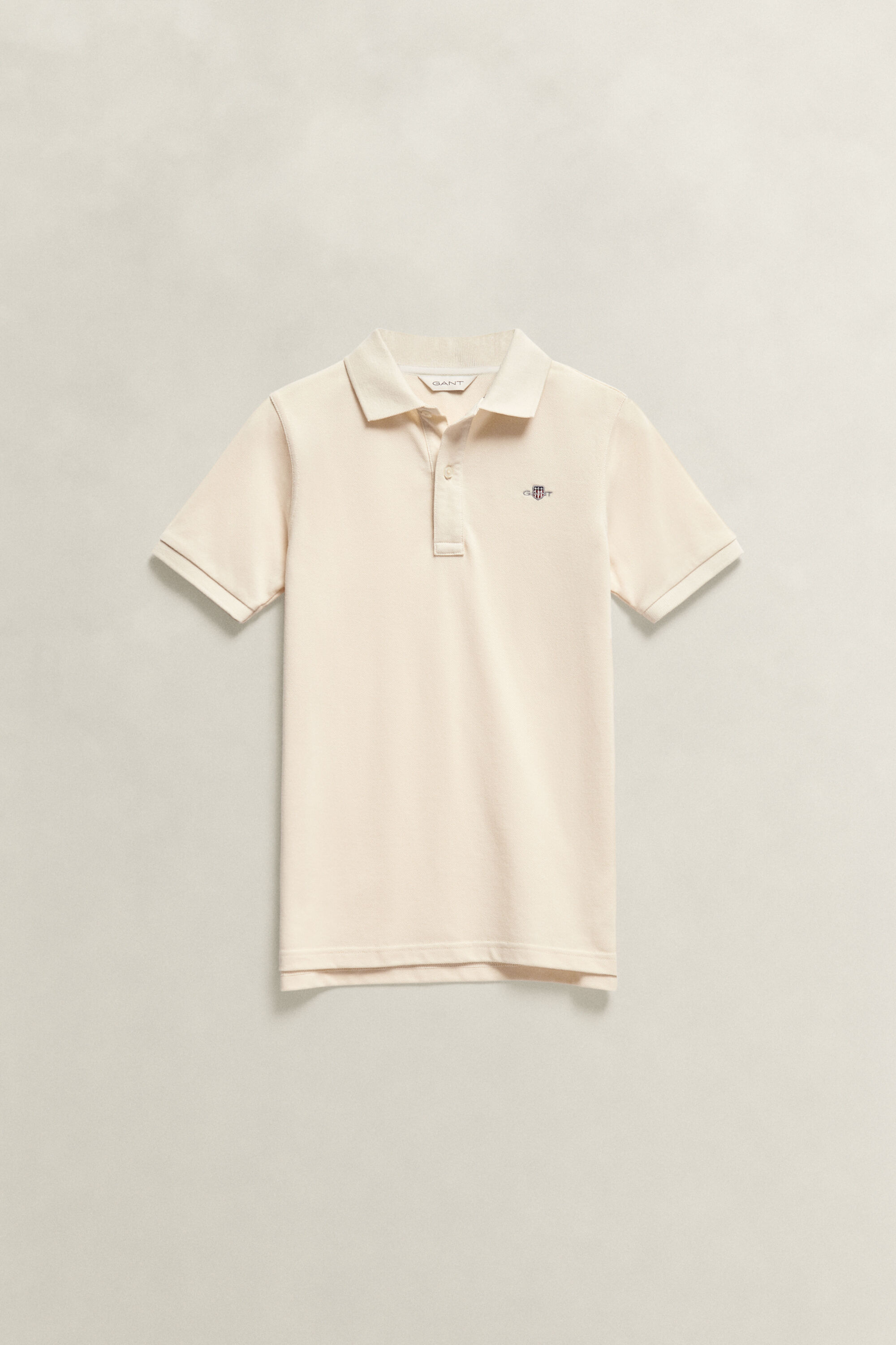 Polo avec écusson Ado