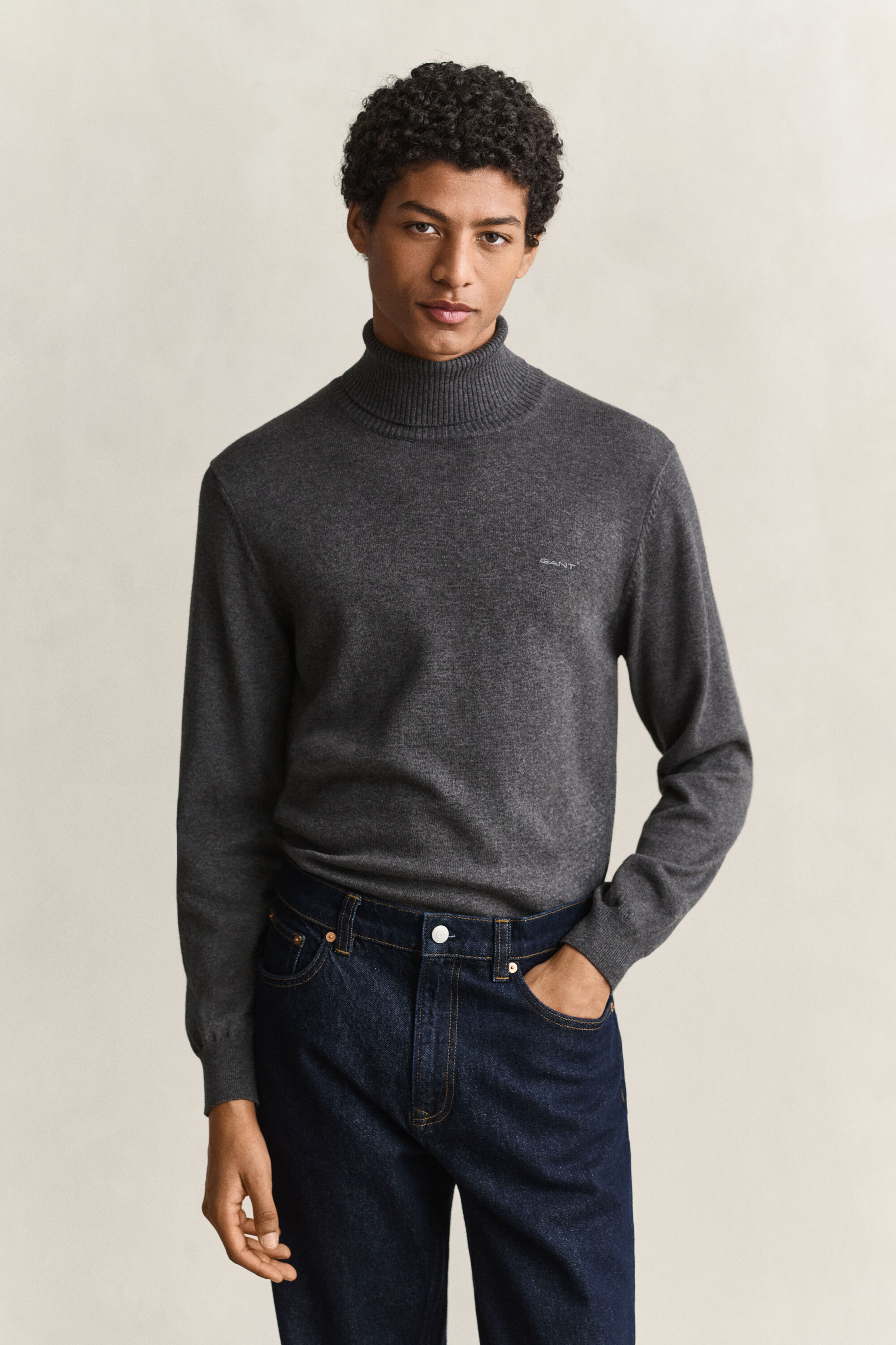 Pull col roulé en coton et laine