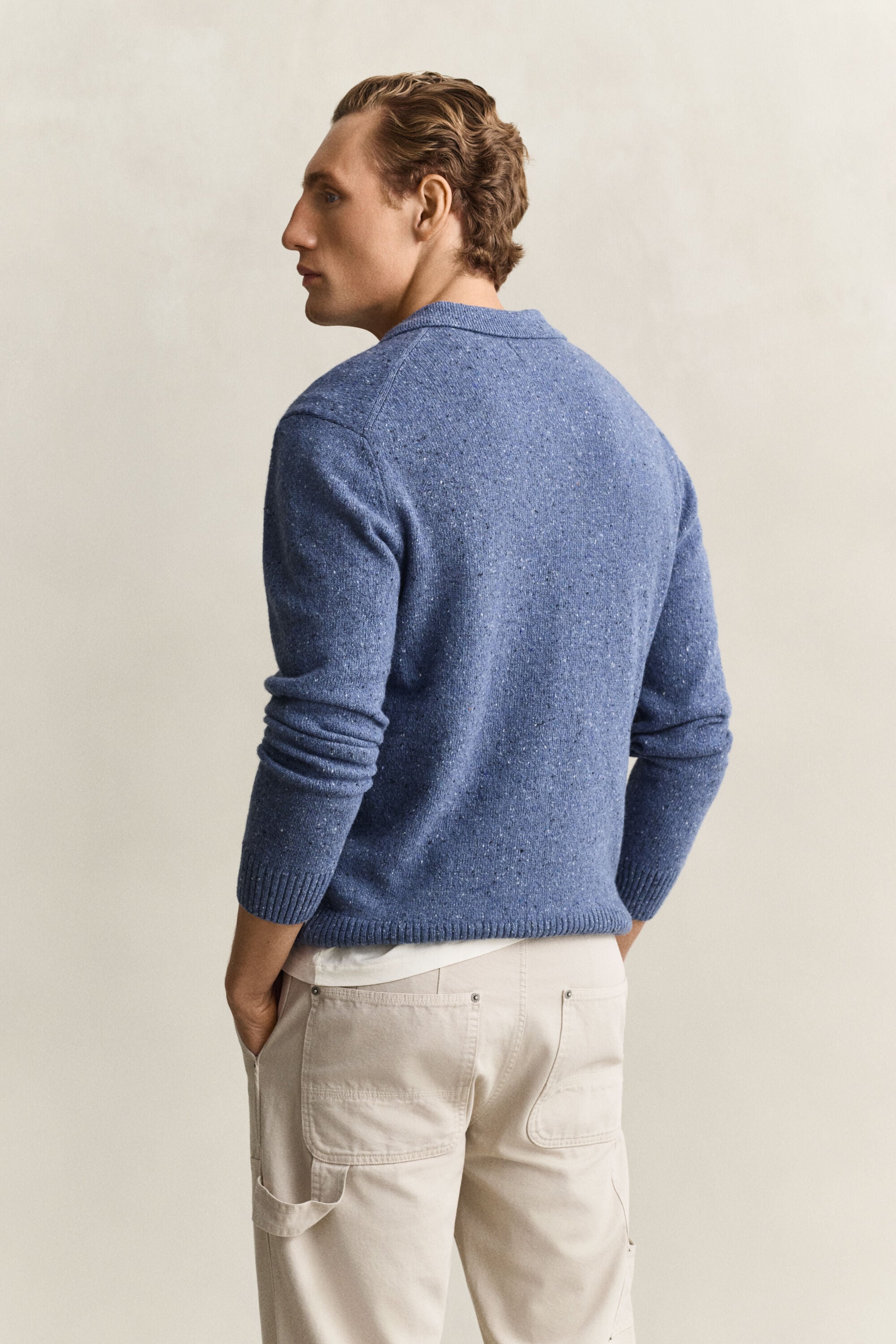 Pull façon polo en laine mouchetée mélangée