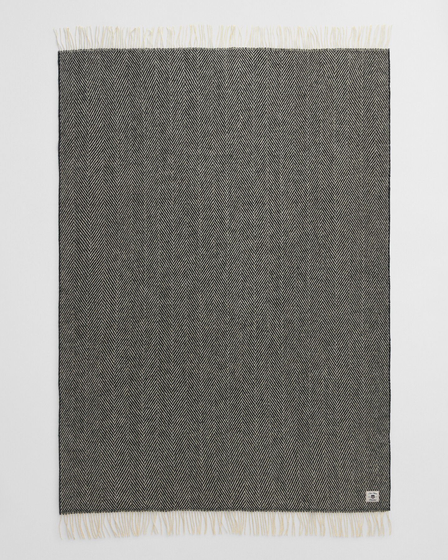 Jeté de lit en laine à chevrons