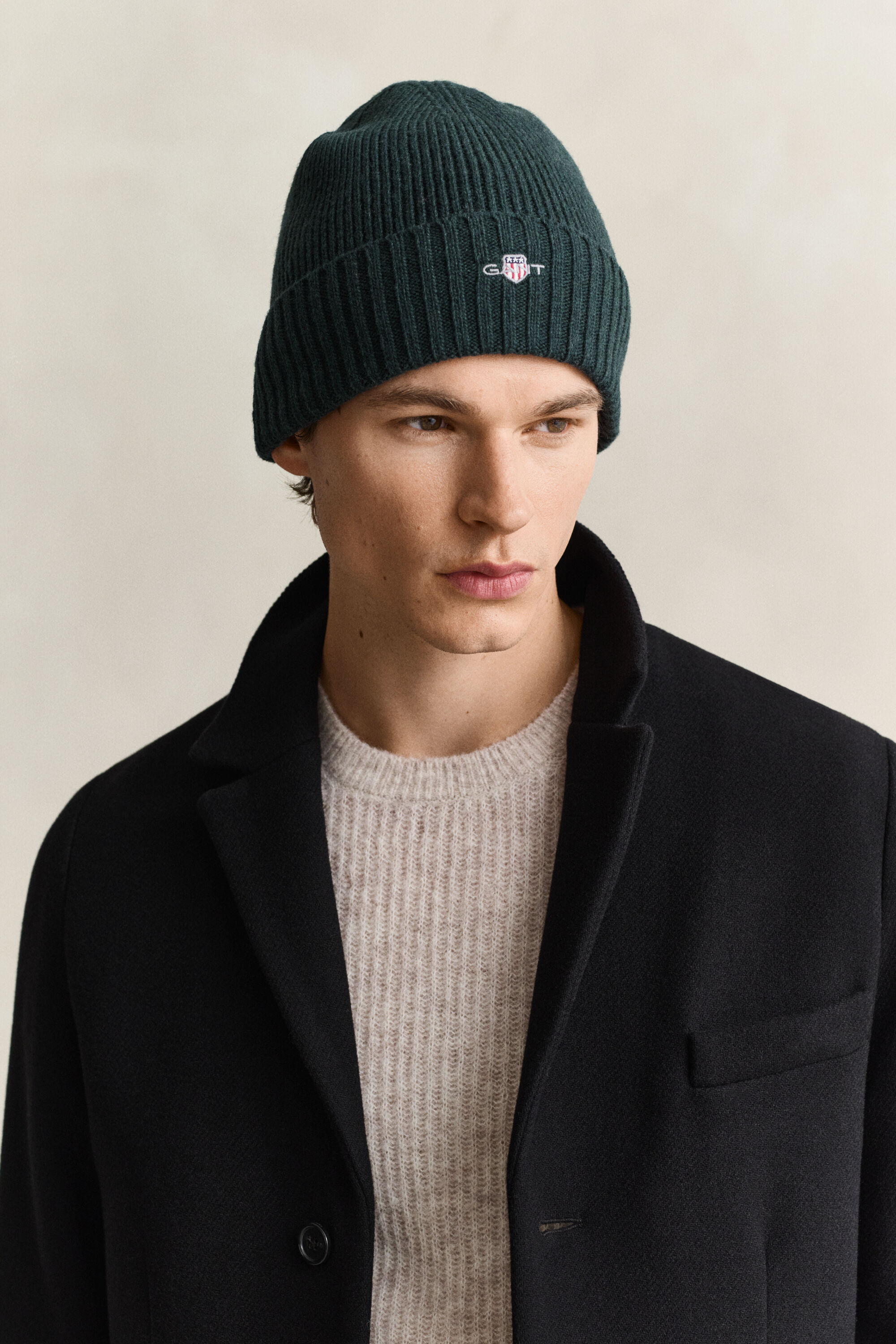 Bonnet en laine avec écusson