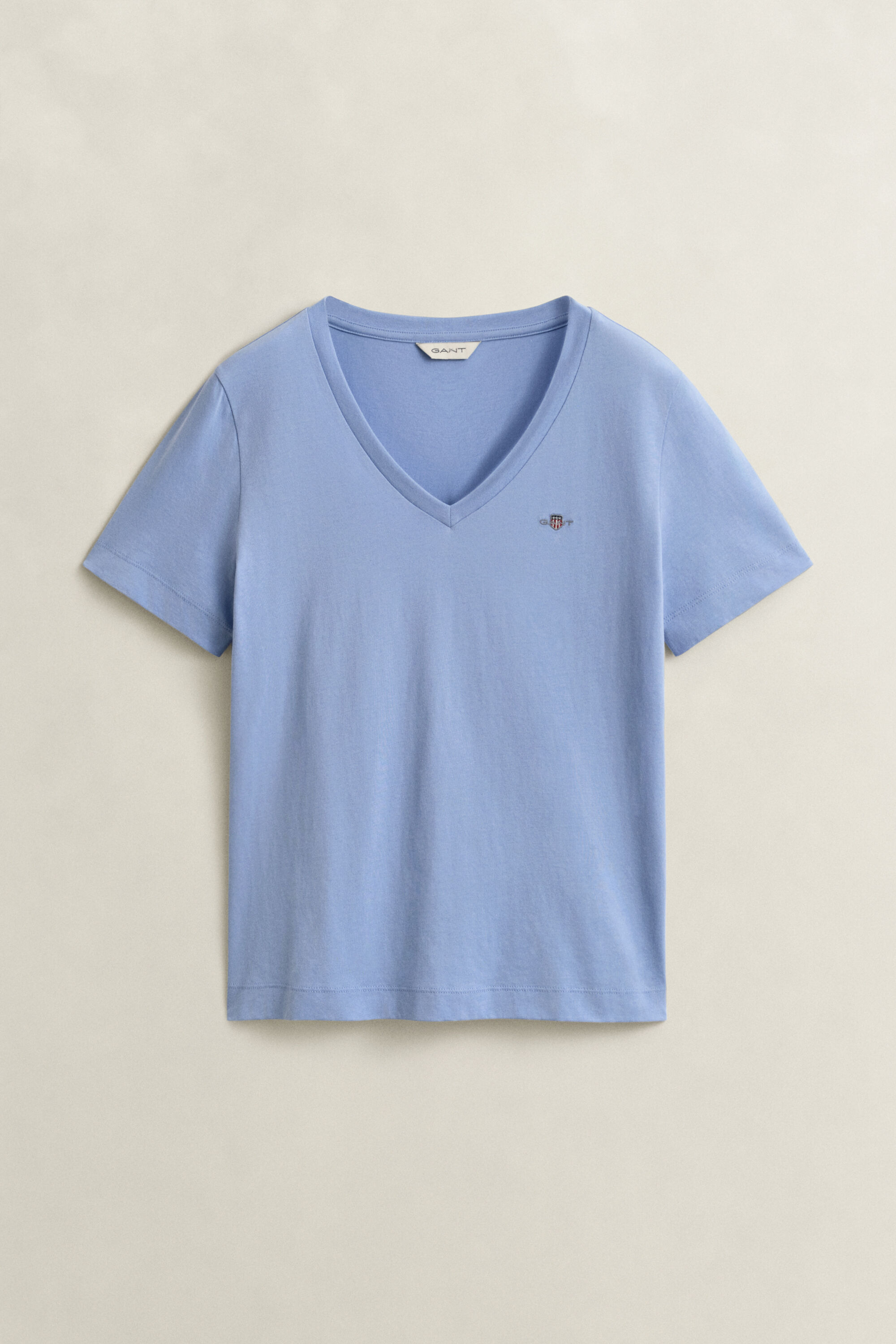 T-shirt col V avec écusson