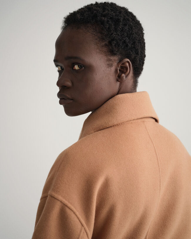 Manteau cousu main avec ceinture