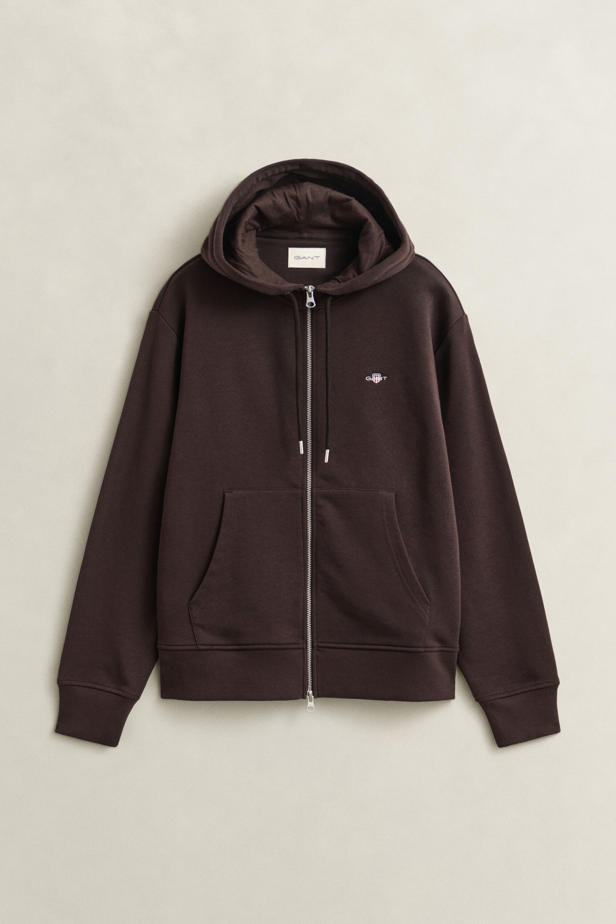 Sweat à capuche zippé avec écusson