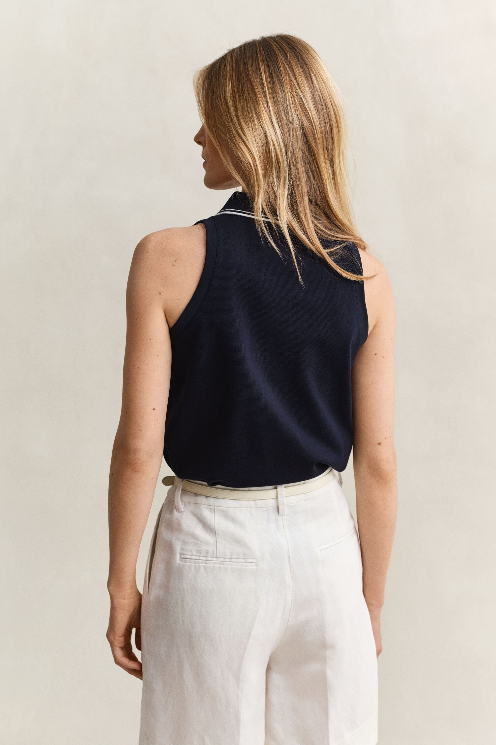 Polo sans manches en piqué