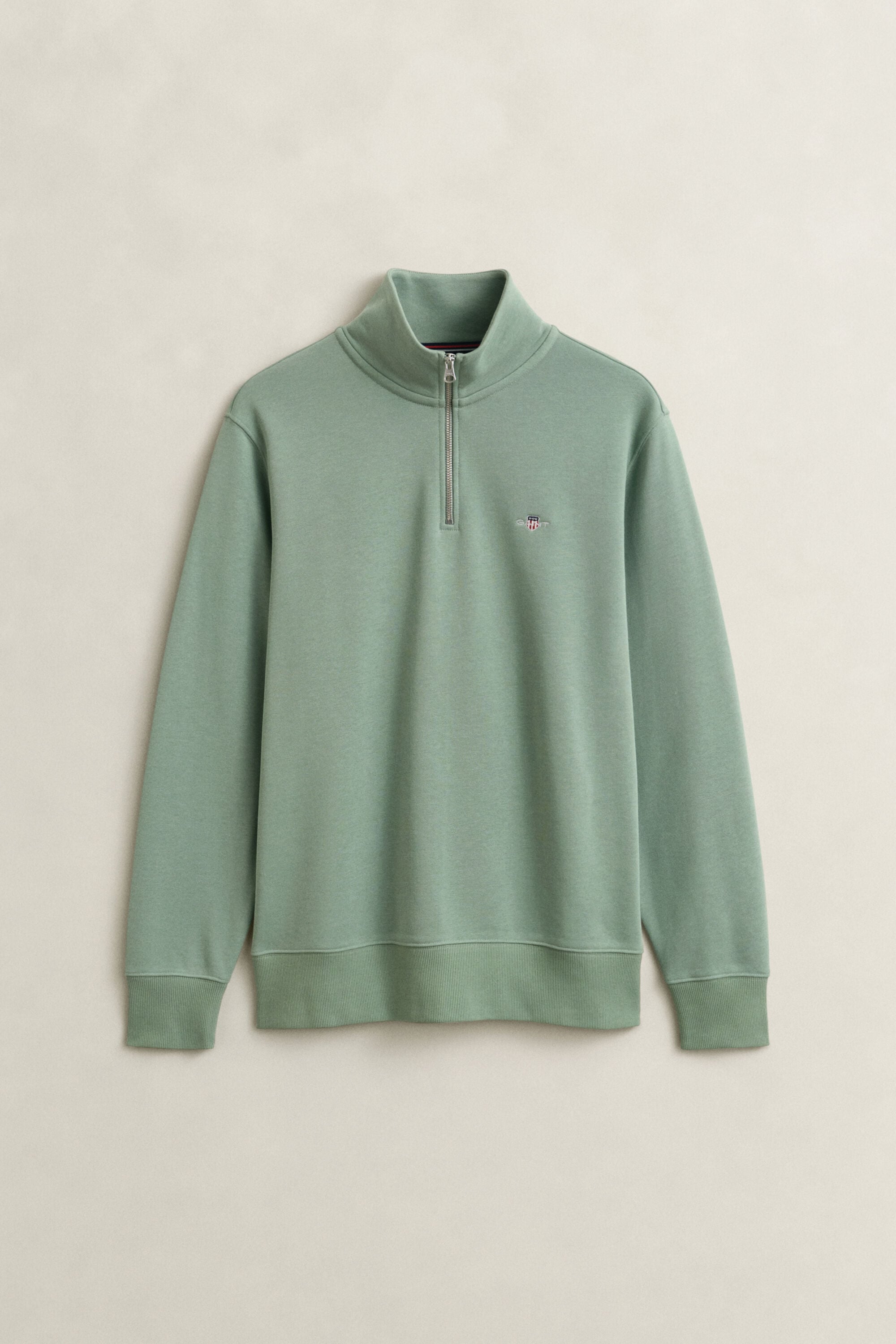 Sweat-shirt à demi-zip avec écusson