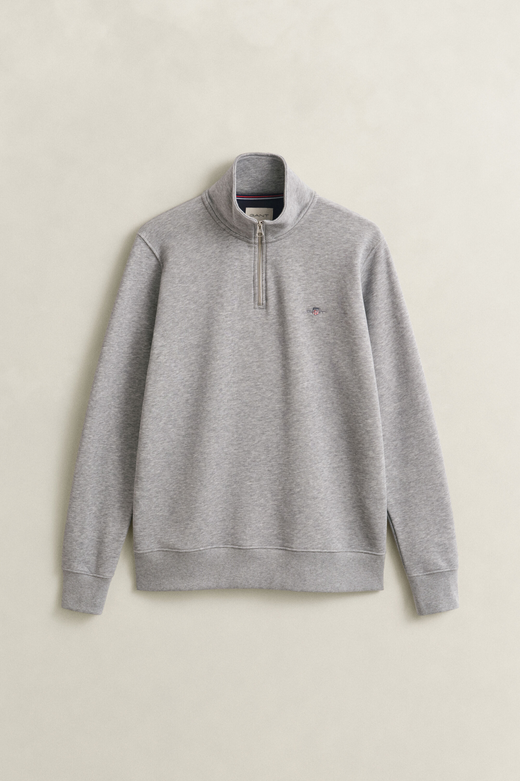 Sweat-shirt à demi-zip avec écusson