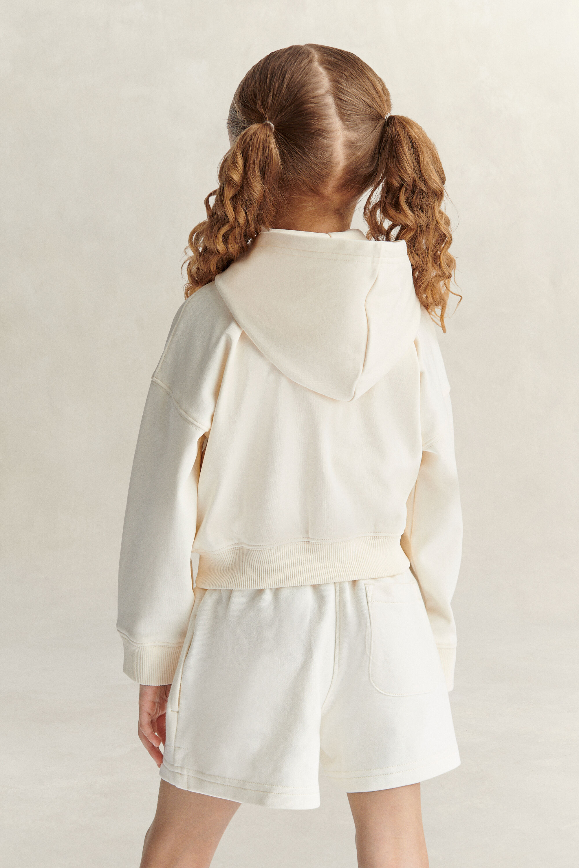 Sweat à capuche court zippé Shield Fille