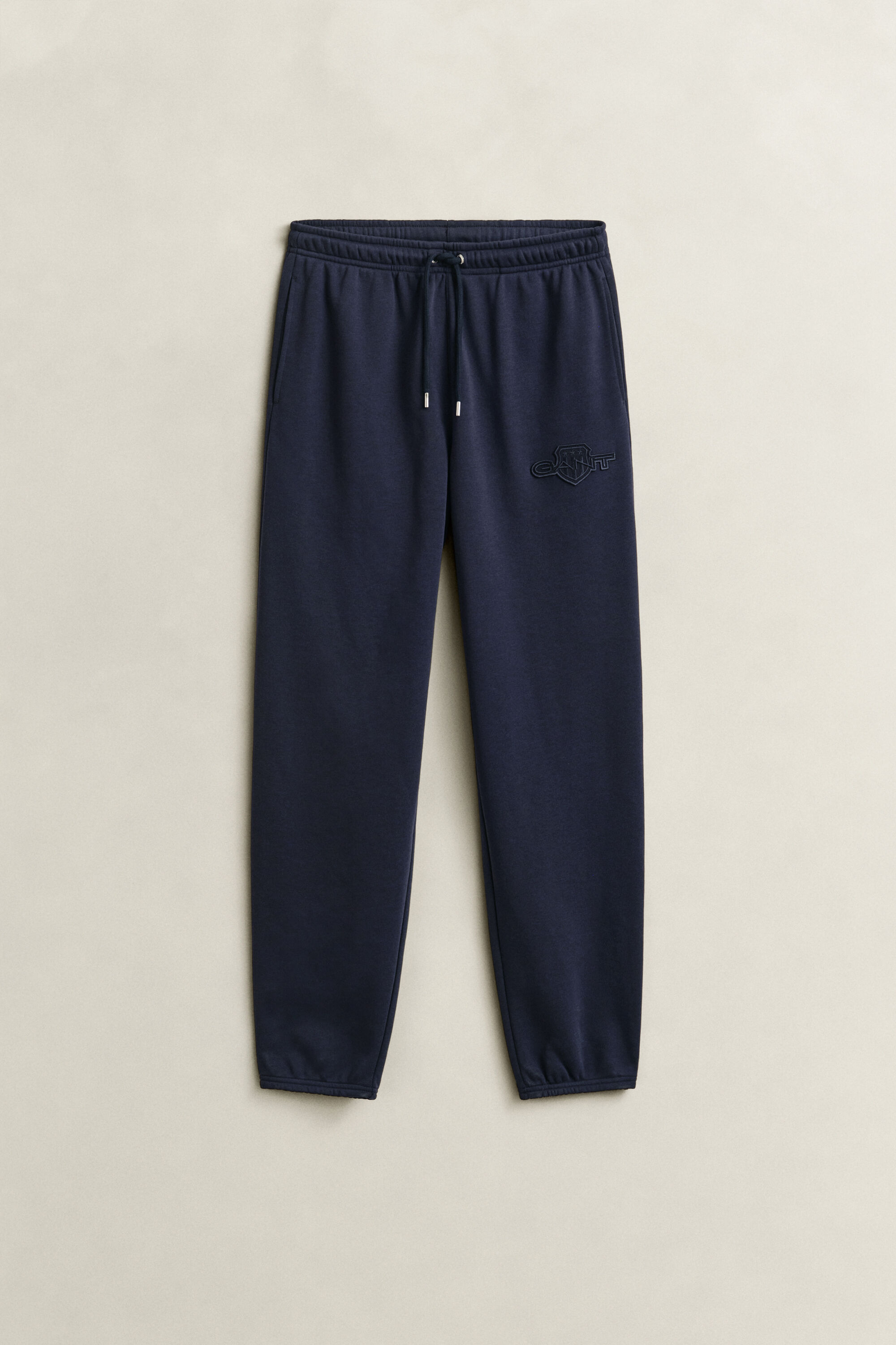 Pantalon de jogging avec écusson ton sur ton