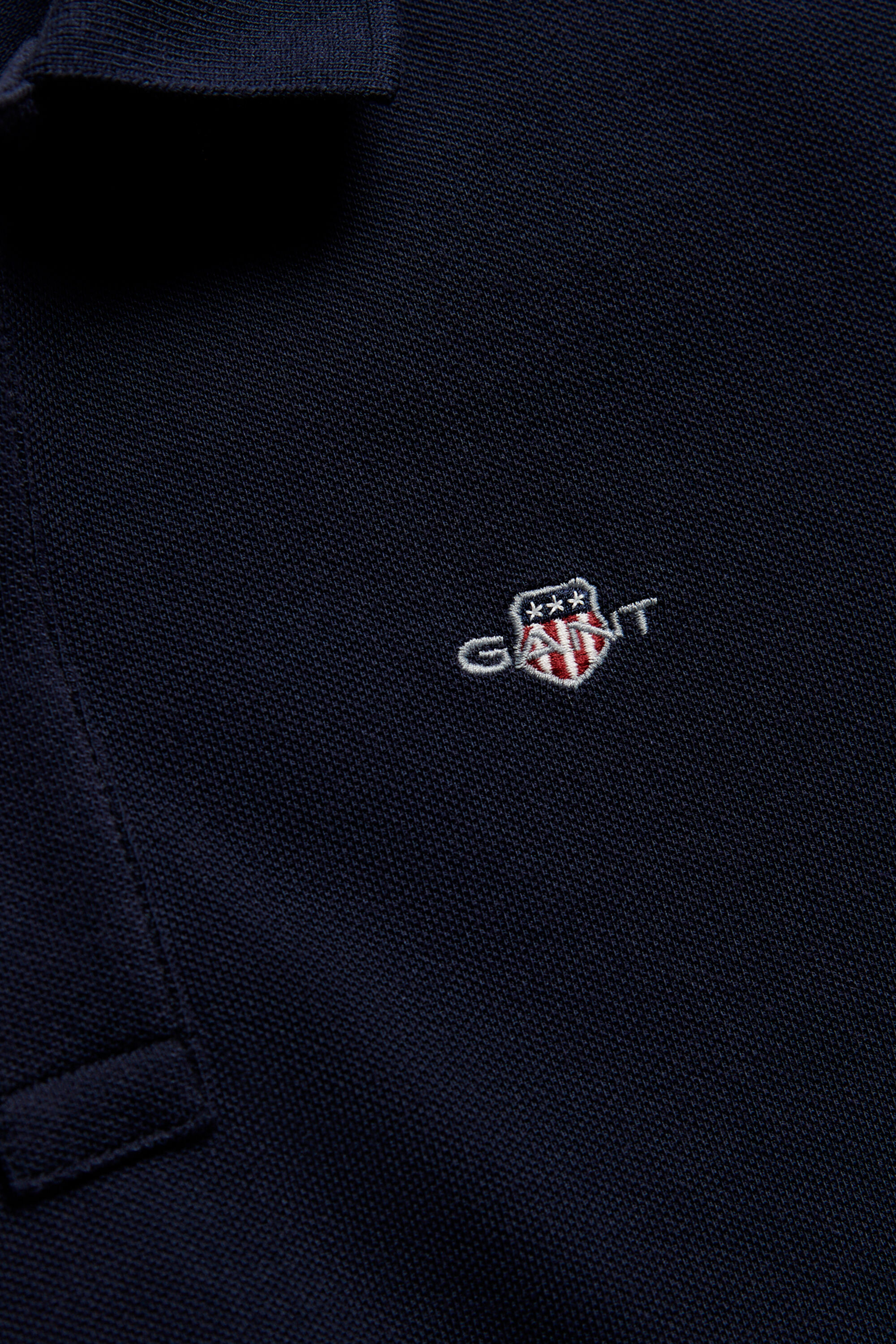 Polo en coton piqué Shield Ado