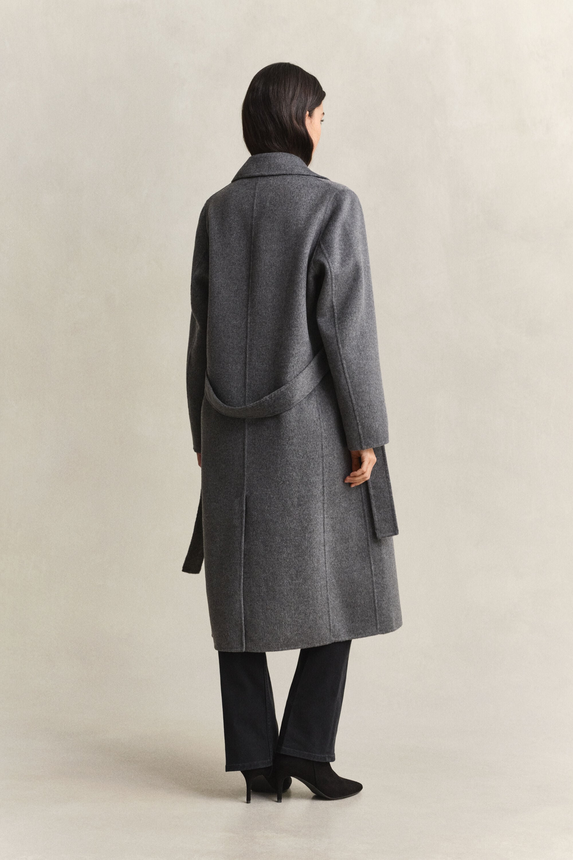 Manteau cousu main avec ceinture