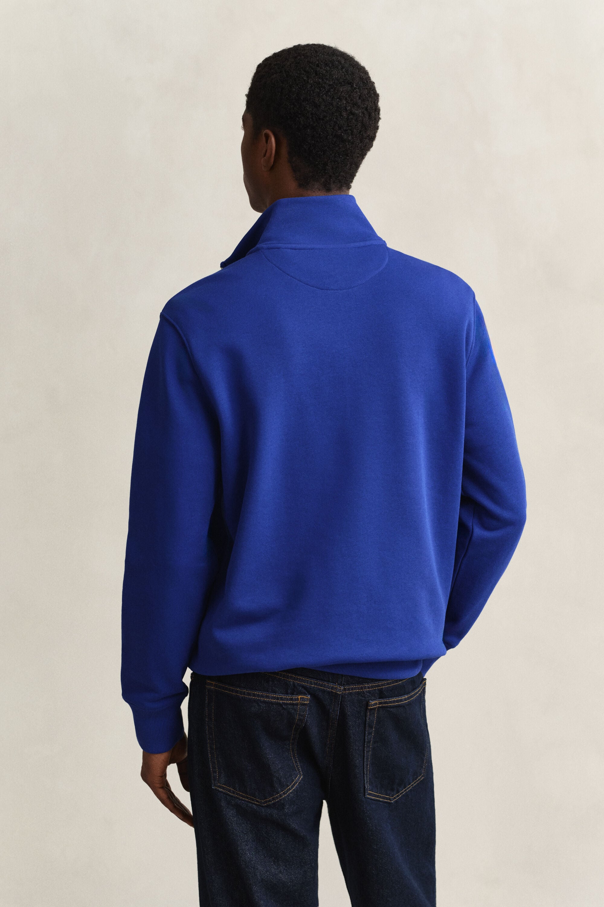 Sweat-shirt à demi-zip avec écusson