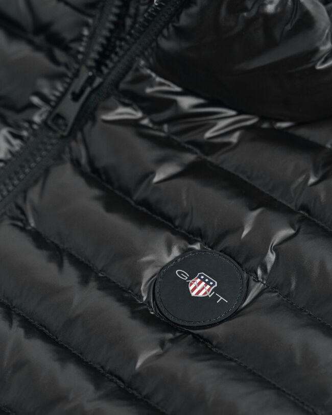 Doudoune sans manches légère et brillante Ado