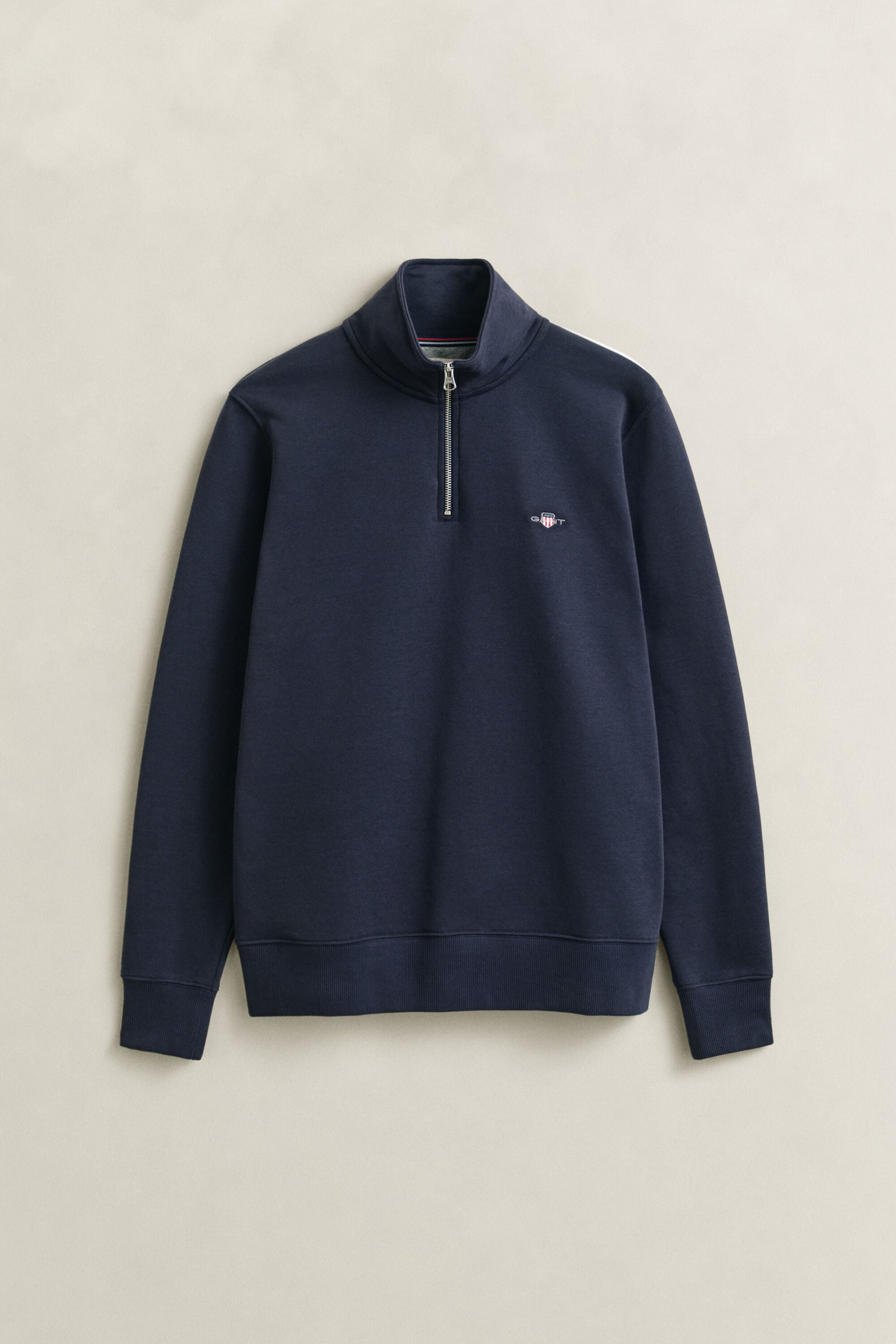 Sweat-shirt à demi-zip avec écusson