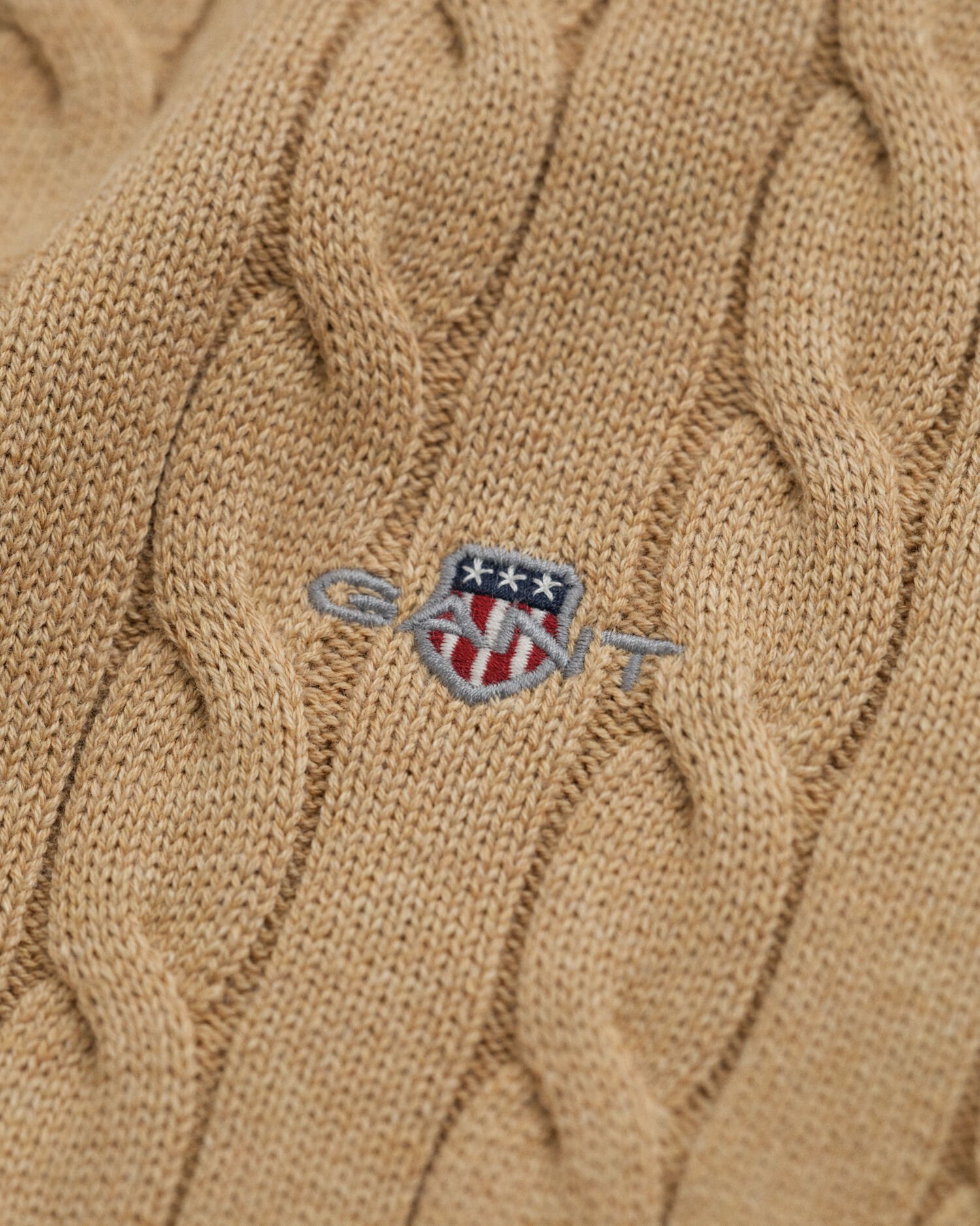 Pull col roulé en maille torsadée de coton