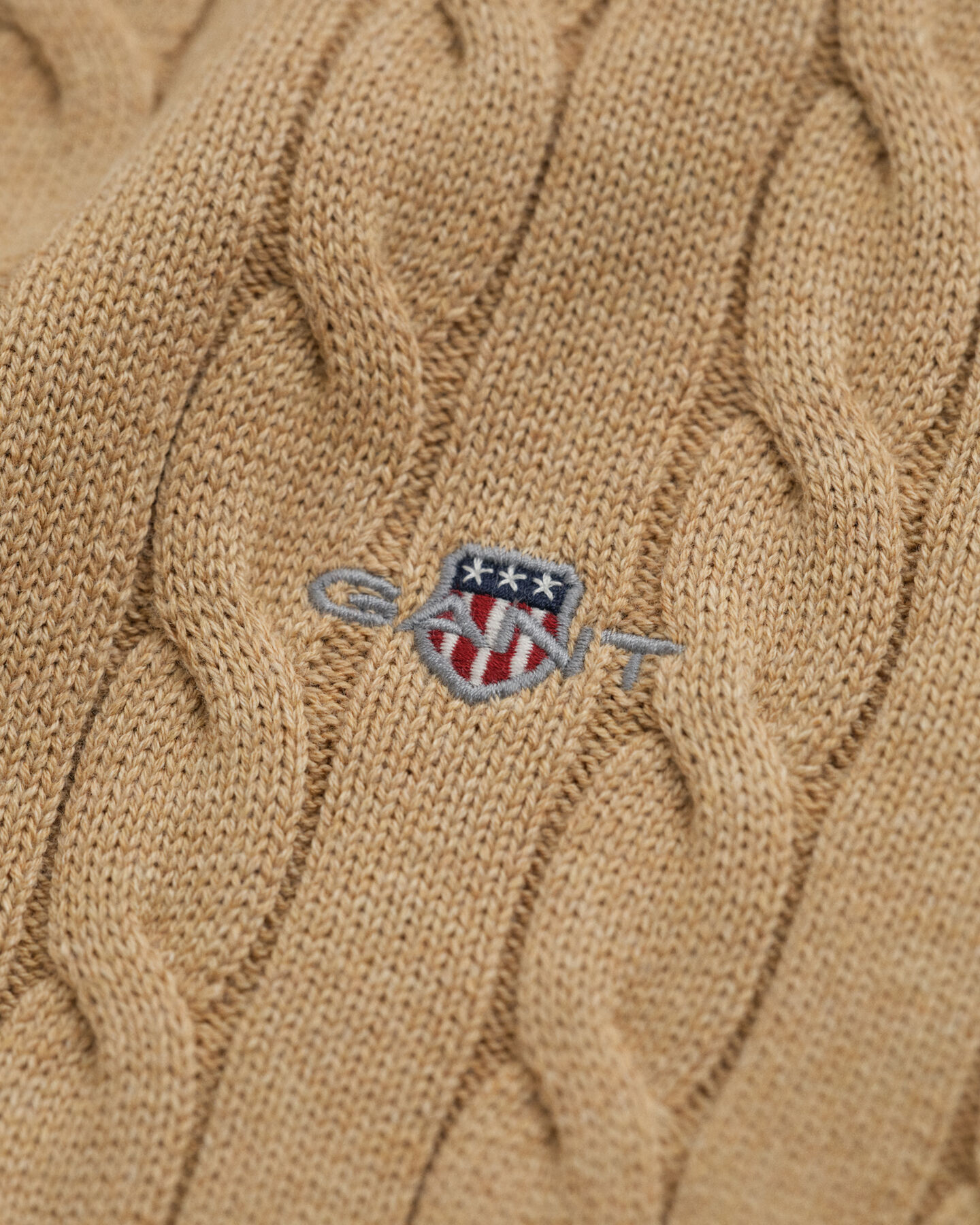 Pull col roulé en maille torsadée de coton