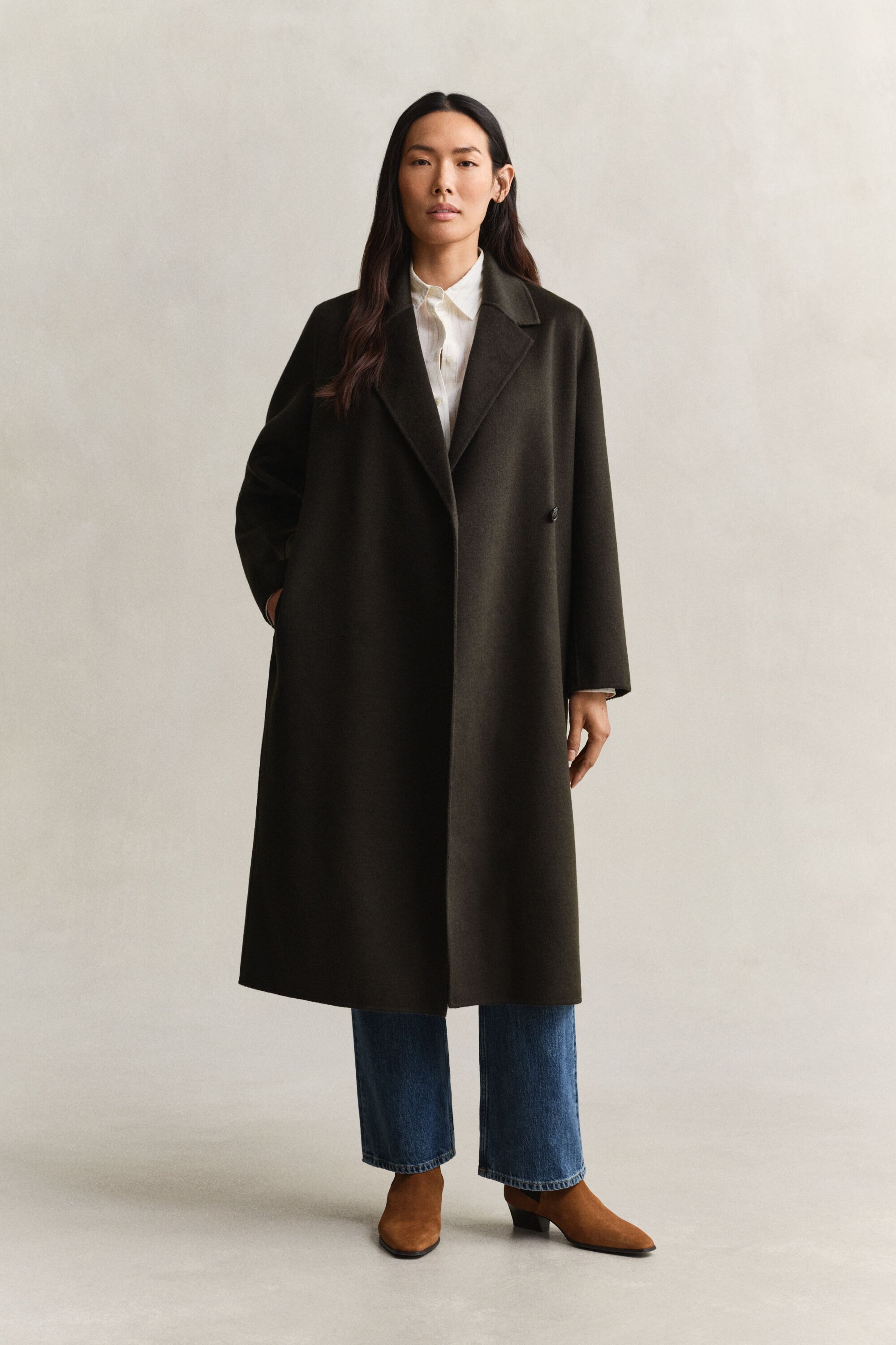 Manteau cousu main avec ceinture