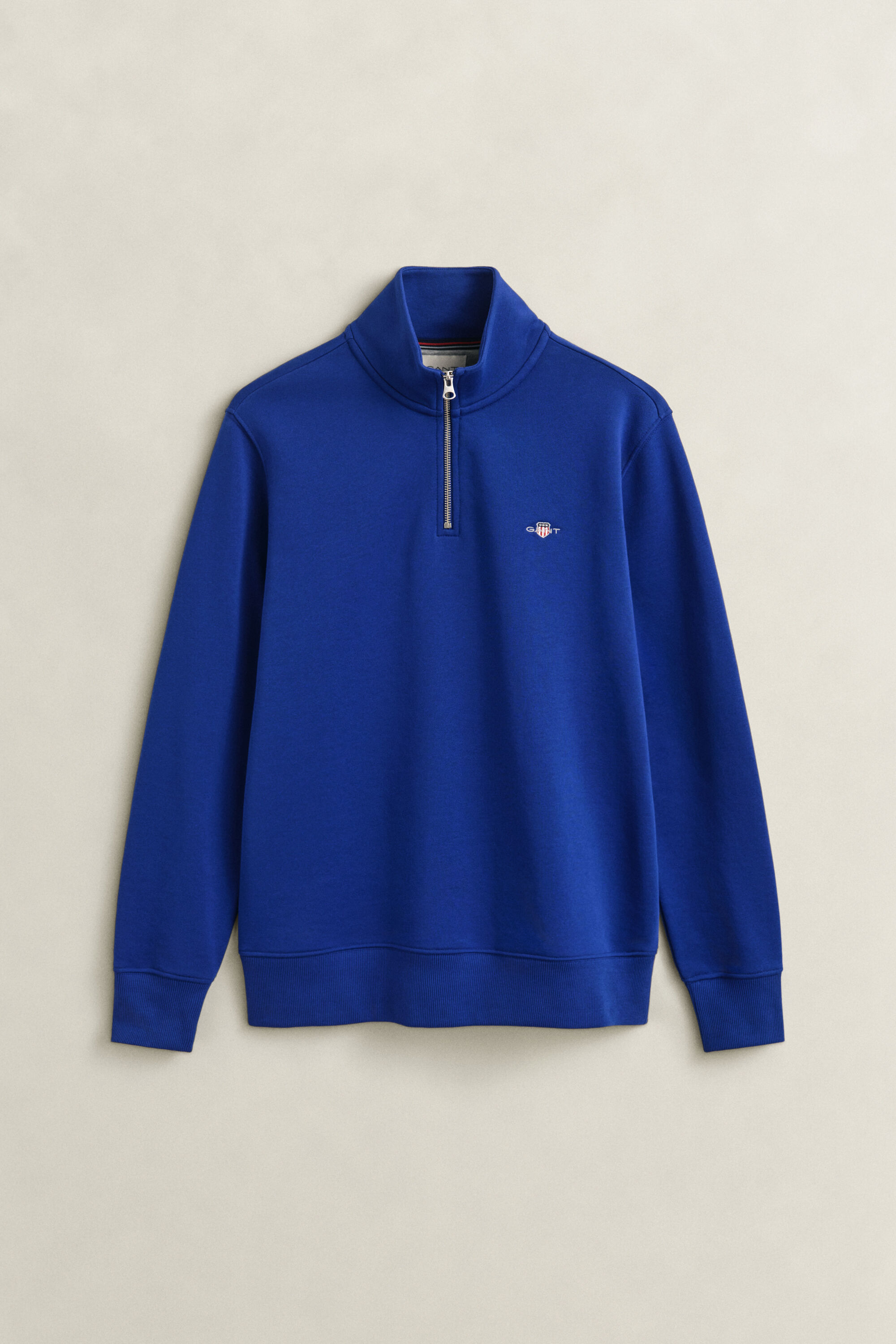 Sweat-shirt à demi-zip avec écusson