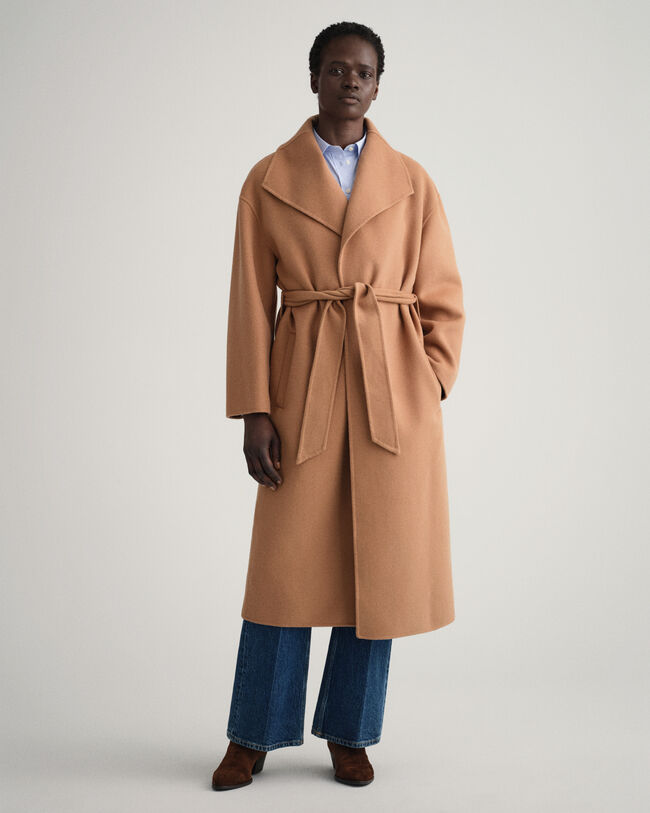 Manteau cousu main avec ceinture