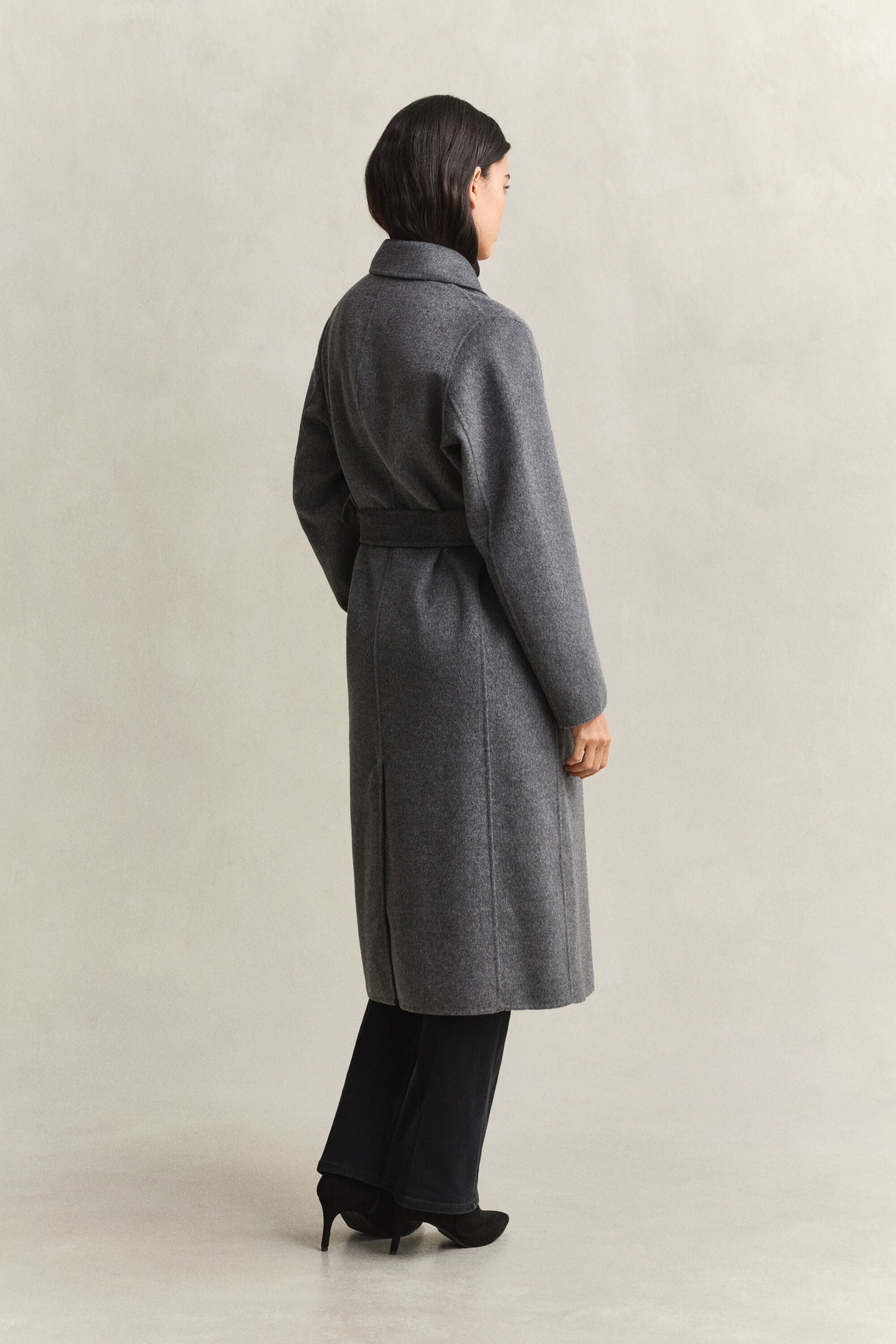 Manteau cousu main avec ceinture