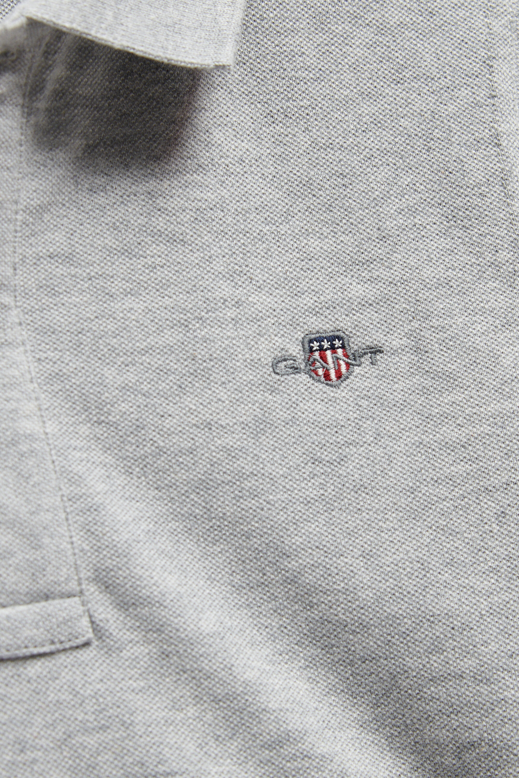 Polo en coton piqué Shield Ado