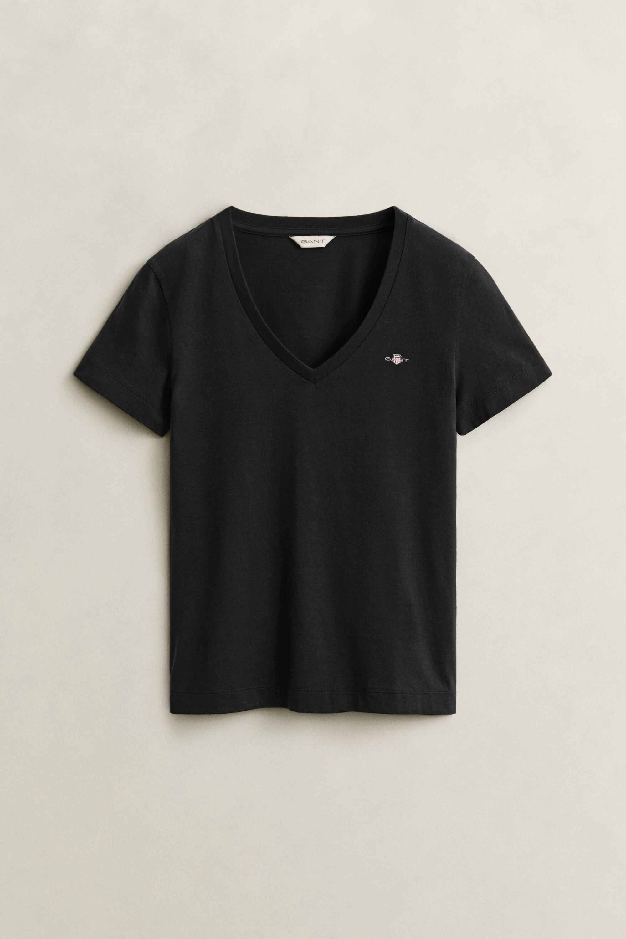 T-shirt col V avec écusson