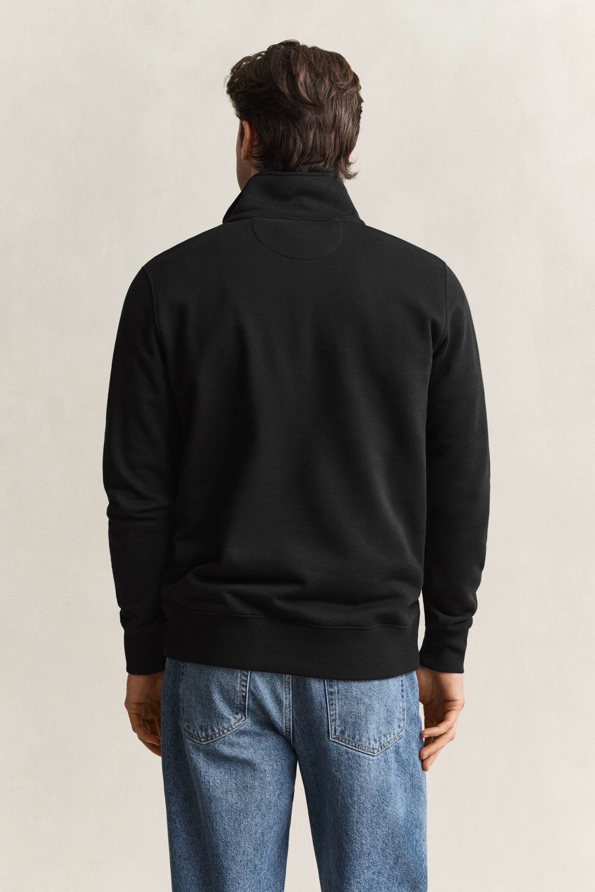 Sweat-shirt à demi-zip avec écusson