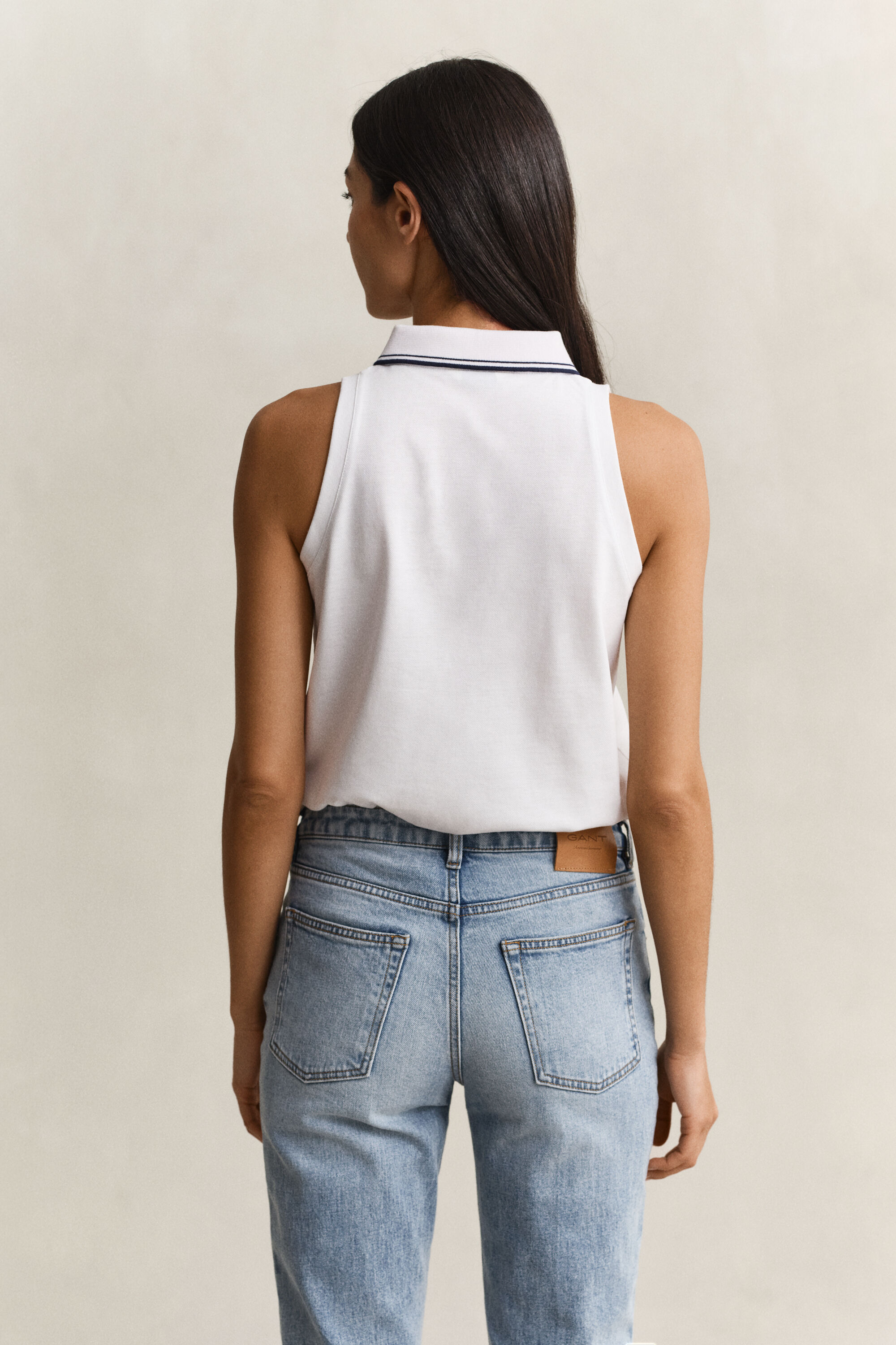 Polo sans manches en piqué