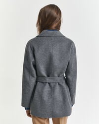 Veste cousue main avec ceinture