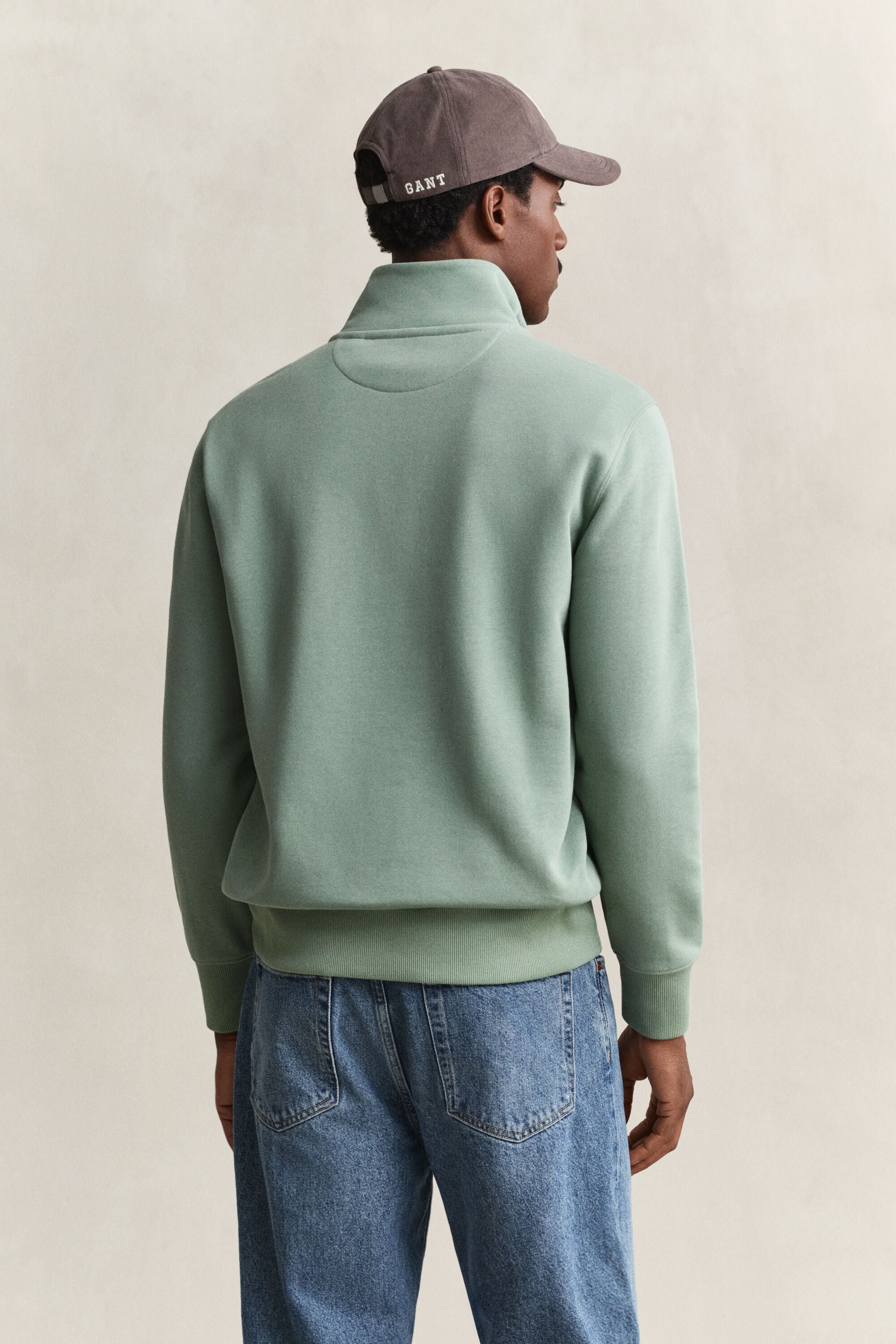 Sweat-shirt à demi-zip avec écusson