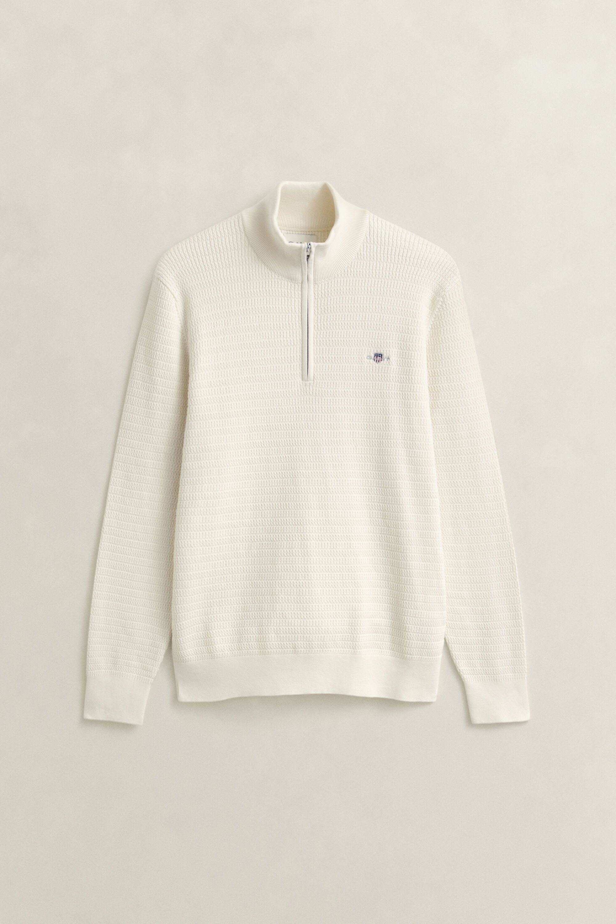 Pull à demi-zip en maille torsadée