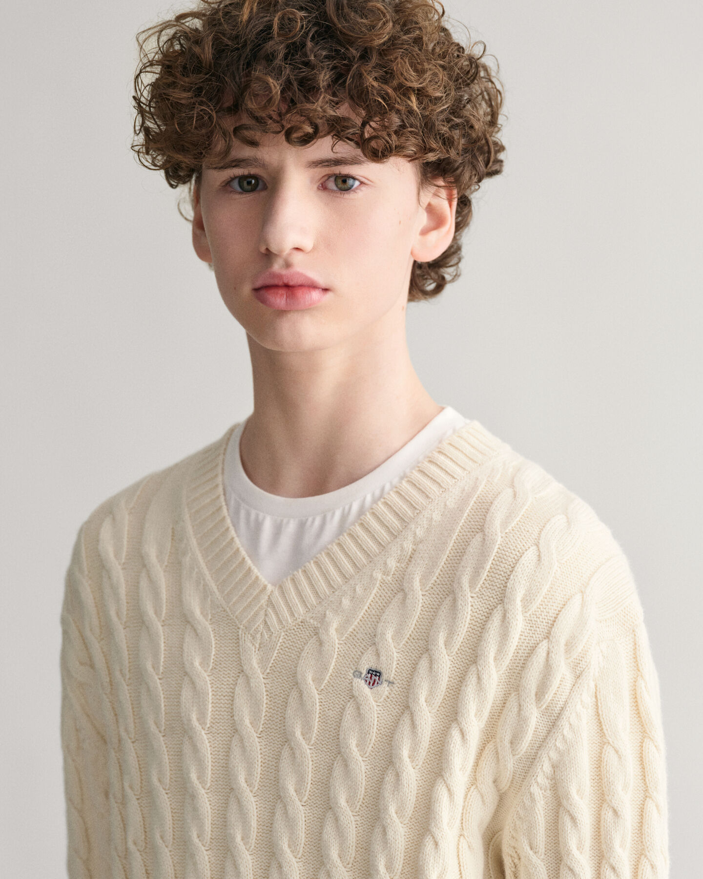 Pull col V en maille &agrave; torsades Shield Teens