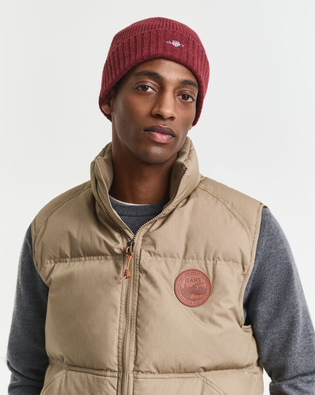 Bonnet en laine avec écusson